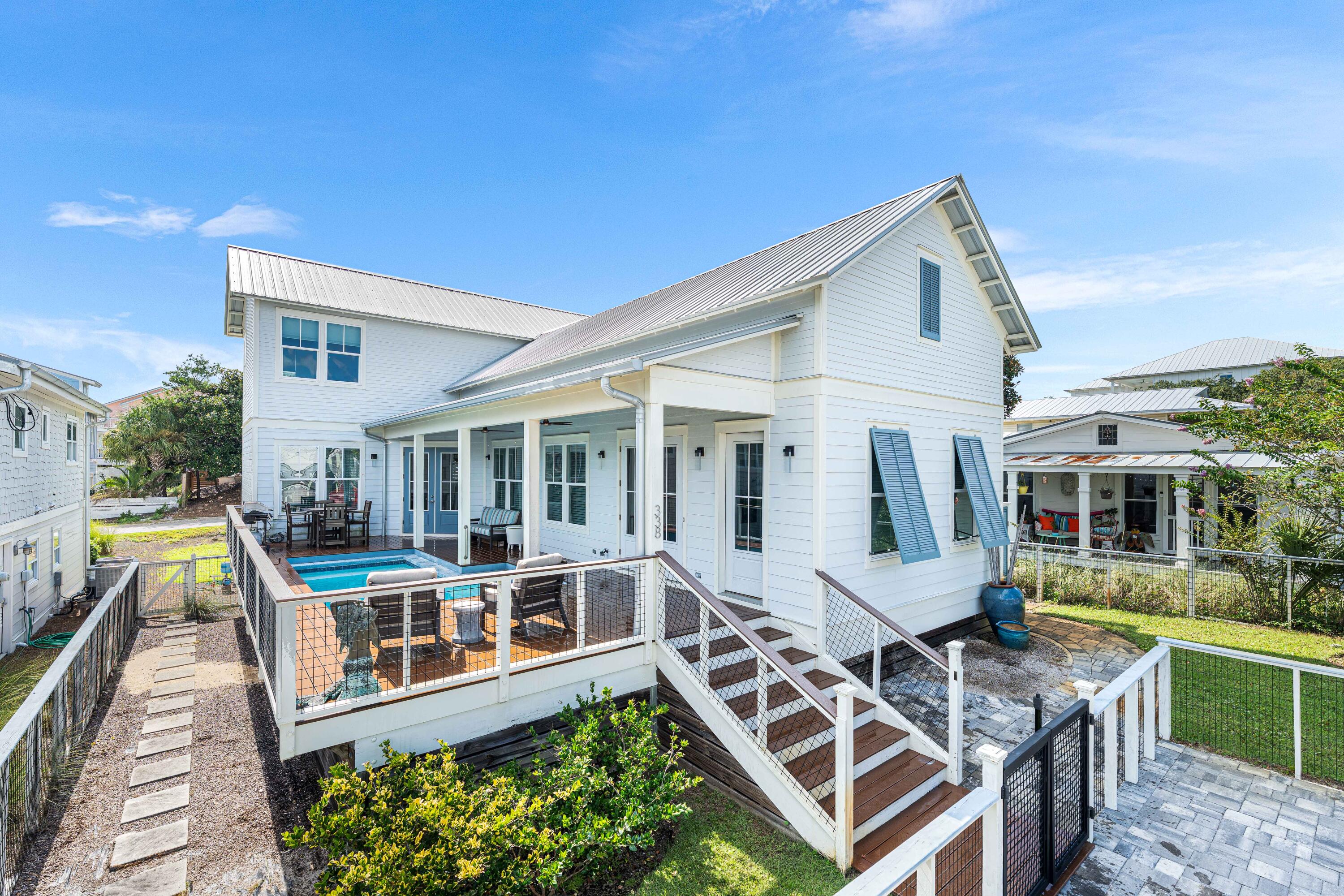 More photos to come This charming beach retreat offers a private pool while being just steps away from the beach access and the white sands of 30A.
