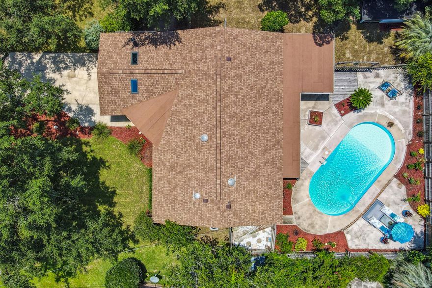 Welcome home to Gulf Breeze Proper. This is your opportunity to enjoy one of the Gulf Coast's most beautiful and sought-after neighborhoods, Casablanca. The lush landscaping gives this charming home excellent curb appeal. Take walks throughout the neighborhood or head down to picturesque Woodland Park! This four-bedroom, three-full-bath home in the heart of Gulf Breeze is primed and ready for your personal touch. Enjoy all the natural light that filters into the main living area. An open floor concept, perfect for entertaining guests. Off the front of the home is an in-law suite, perfect for family or guests that need additional privacy. No HOA, this home could be the perfect investment for long-term or seasonal rentals. Spend days and evenings in the sunroom overlooking the pool or enjoy time on the pool deck soaking up the Florida sun. Roof 2020, HVAC 2019, Foam Attic Insulation installed 4 year ago, German tankless water heater, water purification system, No Flood Zone. Make your appointment today!