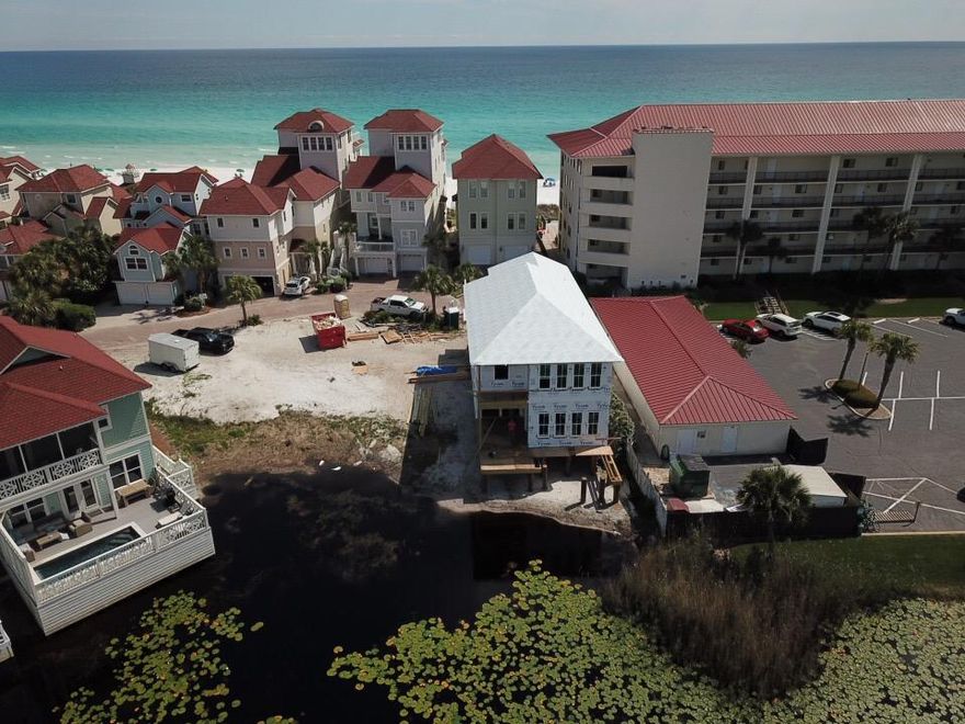 Small gulf view Beautiful Lakefront Home,NEW Construction with Private Pool completion late September. One house off the beach. Rental Projections $125,000. Should be a rental machine. Kitchen has 2 refrigerators. Double washer/ dryerCompletion date late September 2018