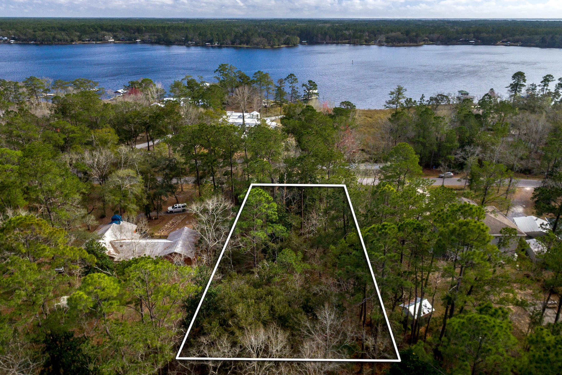 ATTENTION BOATERS...Looking for an affordable building lot, with bayou views, plenty of room to stretch out and also with easy boating access? You just found it! This large building lot, located in the popular Lagrange Shores, gives way to great views of Lagrange Bayou and is just a ''stones throw'' from Freeport Marina. Gorgeous trees, great surroundings and no HOA, this lot has it all. Call today to see this gem!