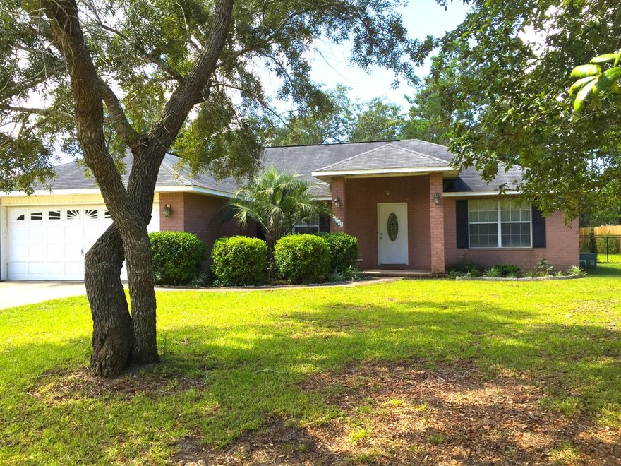 Back on the market! Motivated Seller! This Coogle built home is full of natural light! Welcome to your 3 bedroom, 2 bath Holley By The Sea home. This split floor plan home has been freshly painted with a neutral color palette. The spacious master bedroom with en suite bathroom boasts a separate garden tub and shower. The deep master bath walk in closet has plenty of storage space. A light and bright kitchen opens to the living and dining room as well as the breakfast nook where you can watch the birds play in the beautifully tree-lined back yard. Situated on almost half an acre, the wooded back yard provides you with plenty of privacy. This lot is high and dry! A quick drive down Edgewood will put you at a convenient light to access Hwy 98 on your commute to Hurlburt/FWB/Pensacola.