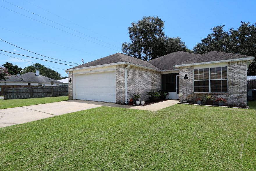 This adorable 3 bedroom 2 bath home has so much to offer. The sweet front porch welcomes you into the spacious living room where you'll find a trayed ceiling, crown molding and laminate flooring running through out the home. The beautifully updated kitchen features stainless steel appliances, a pantry and the bar is a perfect place for morning breakfast. The screened in back porch is a great place to enjoy afternoons and leads to the fenced in back yard. The master bedroom has 2 closets and the updated master bath with a double vanity has lovely tile flooring. The home offers a split floor plan and you'll find the two guest rooms and the updated guest bath opposite the master bedroom. Super Convenient to both Eglin or Hurlburt Field, shopping and Beaches! NEW ROOF with accepted offer.