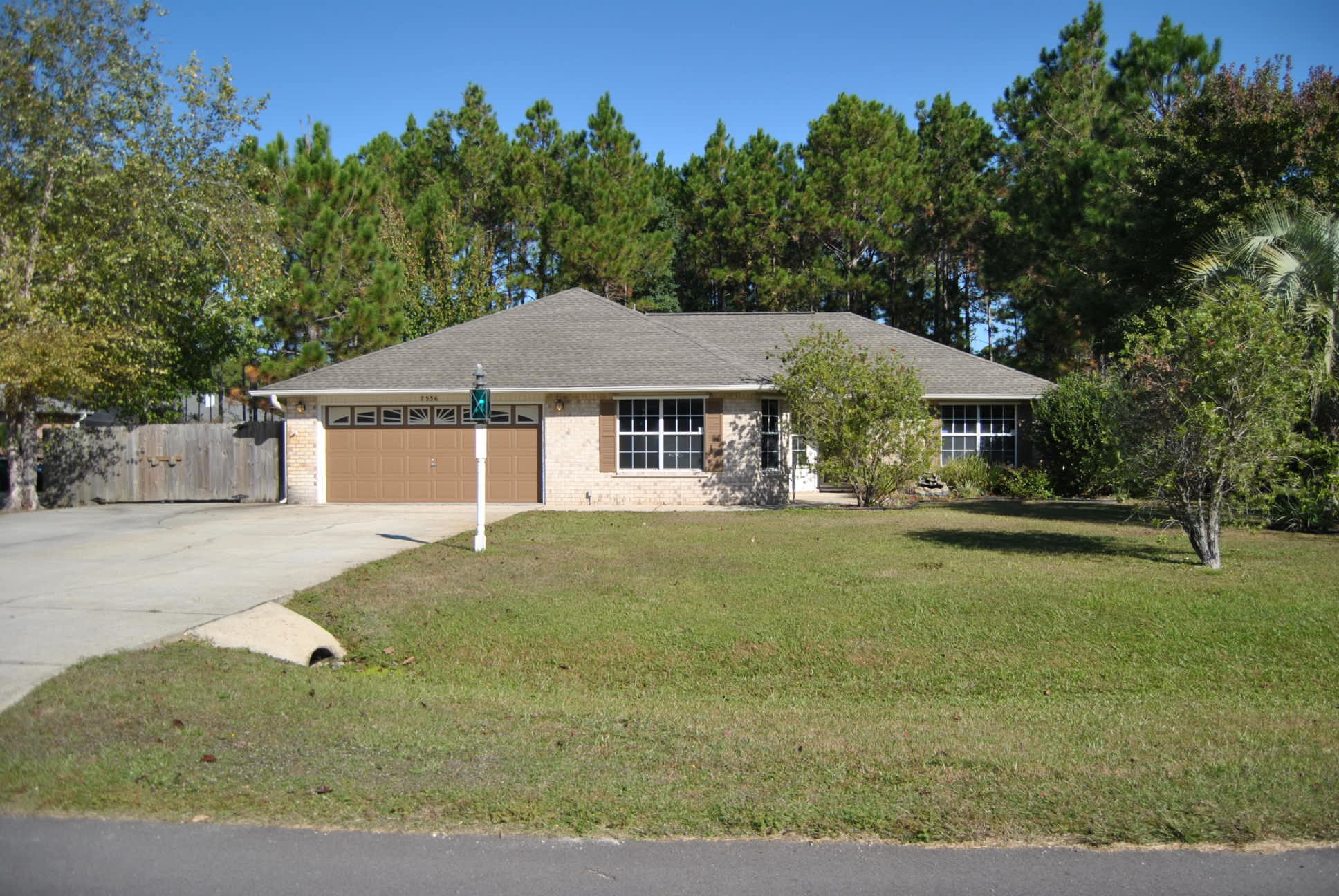 Well maintained ALL BRICK 3 bedroom, 2 bathroom home in Holley by the Sea. This home features two separate family rooms also a heated and cooled sunroom/Florida room,kitchen with upgraded backsplash, stainless appliances, breakfast area, wood floors and brand new energy efficient glass in all windows. Additional features include .45 acre lot with tons of privacy, extended driveway for extra parking, RV parking pad behind a gate, oversized wrap around patio, outside storage shed, gutters, 30 yr dimensional shingled roof and more. Holley by the Sea community offers a multiple community pools, tennis courts, boat launch, club house, workout room, waterfront park and more. Priced to sell this home will not be around long. Buyer to verify all information important to buy