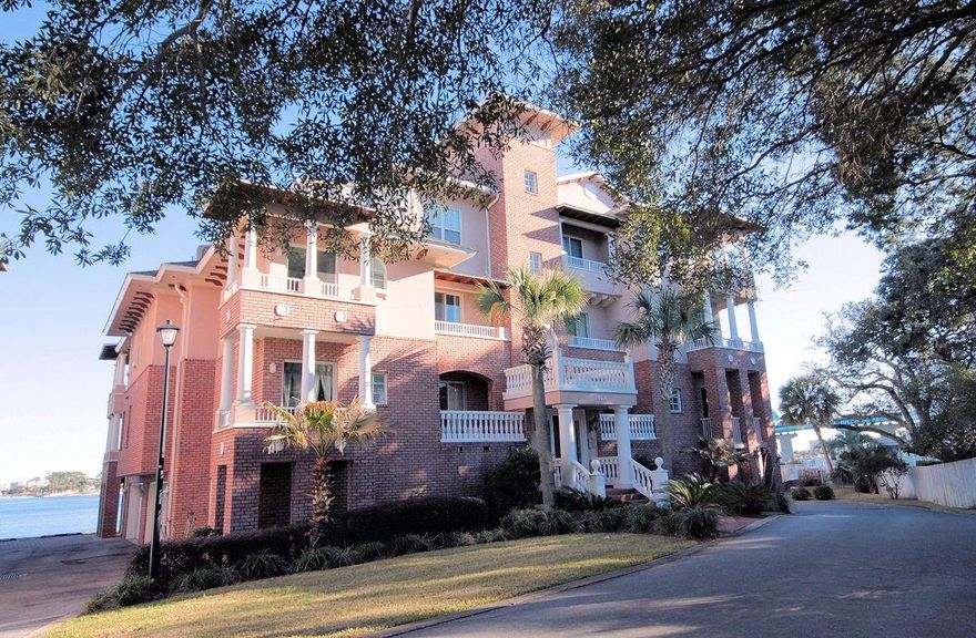 A 2nd floor unit in beautiful Villa di Mare. A waterfront condo project with many amenities. Walk to a number of restaurants and shopping, Beach is just across the Brooks Bridge. Condo overlooks Choctawhatchee Bay and comes with a deep a 16X40 ft water boat slip that has electricity installed by a certified electrician. No carpet in the unit tile flooring throughout. Master bath has double vanities, whirlpool tub and separate shower with body sprays. The washer and dryer will convey with the unit. All bedrooms have $5000 worth of custom closet shelving and all cabinets in kitchen and baths are upgraded to Cherry. Complex has an in-ground pool. Villa di Mare features five builds and five condos per building. No short term rentals allows. Two car garage and separate 12 X 14 storage