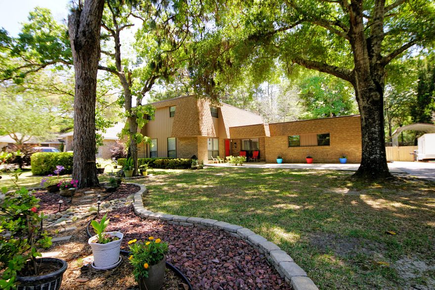 Amazing brick home located in the highly desirable Poquito Bayou neighborhood. Conveniently located just 5 minutes from Eglin AFB and 15 minutes to Hurlburt Field. Beautiful big lot with many mature trees and plenty of room for outdoor entertaining. The backyard has a patio area, firepit area, kid's slide and a carport prefect for a boat/RV. The inside of the home has been completely renovated. On the first floor we have the kitchen which has stainless appliances, granite counter tops with custom cabinets. Next to the kitchen is the spacious dining room. Off the kitchen there is also a den/office space with a wood burning fireplace and a slider door leading to the 17x11 screened in patio to the backyard.