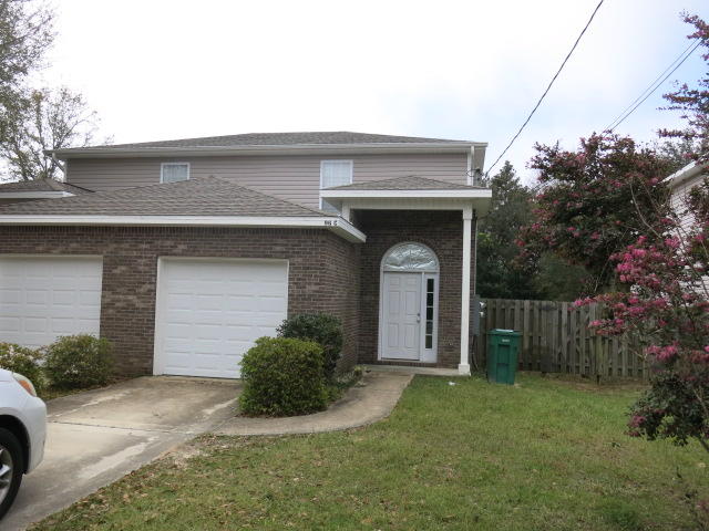 Gorgeous town home in quiet area of Shalimar. Large rooms with 2 full bath baths upstairs for each bedroom. Driveway has room for two cars and one in garage. The backyard in fenced in with large open patio. First term of the lease will be for a period of 6 months. No Smoking. No Pets.