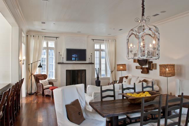 This is the quintessential beach house, complete with three bedrooms, three full bathrooms and two half-bathrooms. Enter this home, and you are greeted with a large open living, dining, and kitchen great for entertaining. An entire wall of windows allows for open views of the courtyard area, while limestone counter tops and stainless steel appliances bring an effortless chic to the room. Just behind the living area is a first floor master, equipped with large private bathroom and shower, and private shuttered porch, great for sipping your morning coffee. Head to the second floor, and notice the walls are white-washed adding great detail throughout the second floor. Once up stairs you will notice a second master, equipped with a large private bathroom and shower, and private balcony.