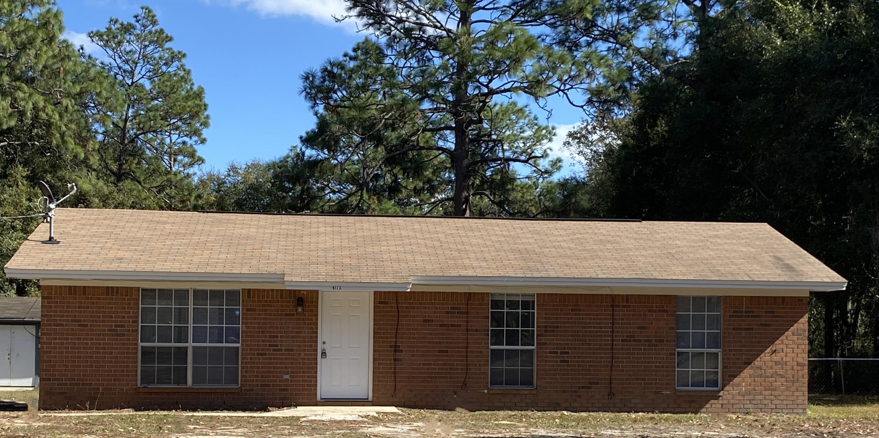 Almost an acre.  3 bedroom 1 bath home has new LVP in the living room, bedrooms, and hallway.   Kitchen, utility room, and bathroom have ceramic tile.  New painted through out the house.  Walk thru kitchen with the utility room at one end and dining area at the other end.  New ceiling fans in living room and both bedrooms.  Kitchen has a new Refrigerator.  Back yard is amazing.  Lots of room for your fur baby and kids to run and play.  This one will not last