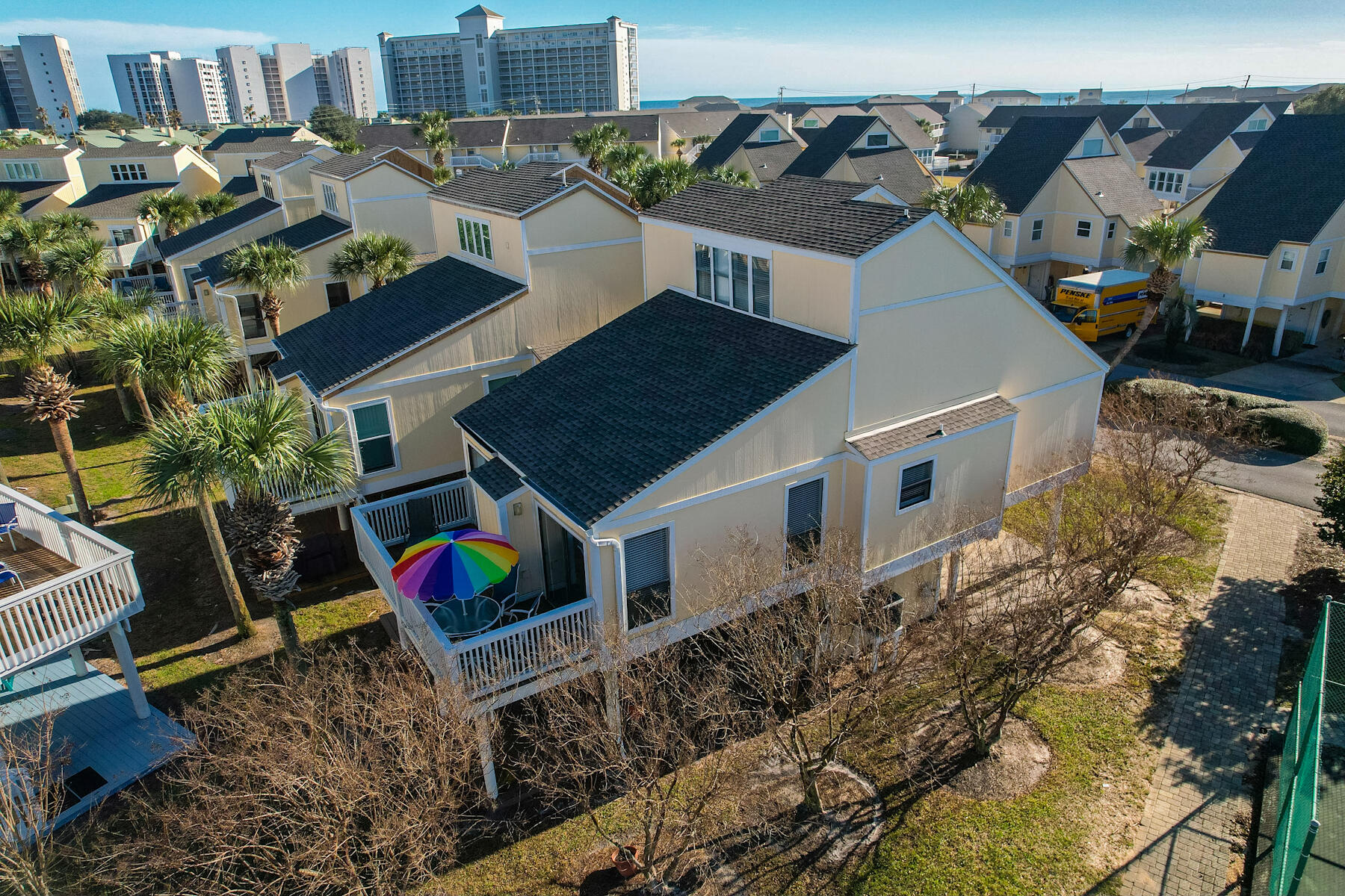Charming cottage in popular Sandpiper Cove! Enjoy the benefits of condo living with no common walls to share with neighbors. Rental ready w/excellent financial history. Relax on either of two decks; a ground level deck offering exceptionally spacious outdoor living or the upstairs deck through two double sliding doors off the great room.(Peeks of the Harbor from west facing windows.) Entire top floor is the master suite offering privacy, comfort, ensuite bath, lrg.walk-in closet and extra storage. No hi-rises on the property; drive directly to your condo and enjoy the convenience of covered deeded parking. Popcorn ceilings removed, freshly painted, tile and LVP flooring and fully furnished. A 3yr Special Assessm is currently in place, the amt decreases each year See Documents. continued