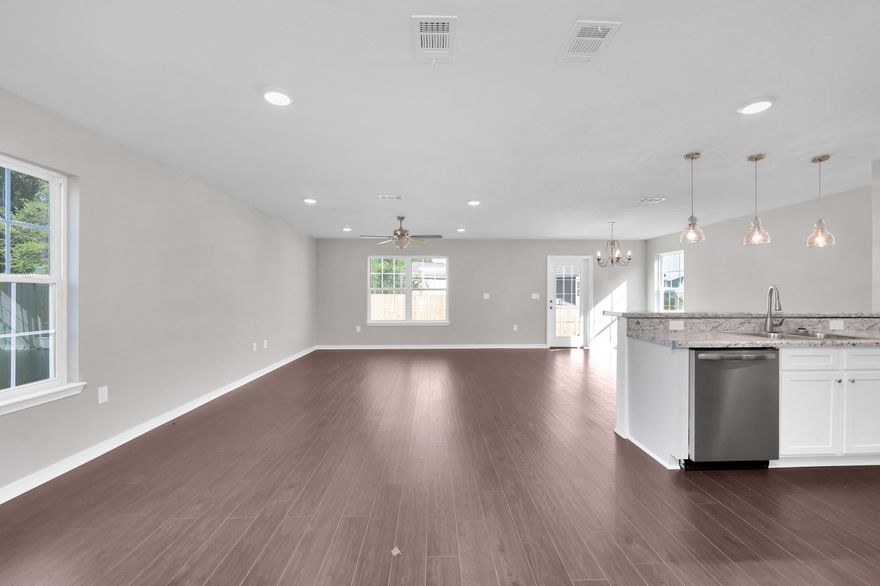 Looking for room? Well look no more. This Crestview home offers just what you've been looking for. Award winning cottage style home features an open kitchen with stainless steel appliances, side by side refrigerator, breakfast bar, pendant lighting and pantry overlooks the living and dining area.  Upstairs laundry room. Do you have a king size bed and no room left in your bedroom? Well this Master is plenty big! Spacious bathroom as well with dual vanities and walk-in closet. Downstairs half bath for guests. The exterior is classy in style with full stone columns, Cedar Shake siding over garage, and lush landscaping.