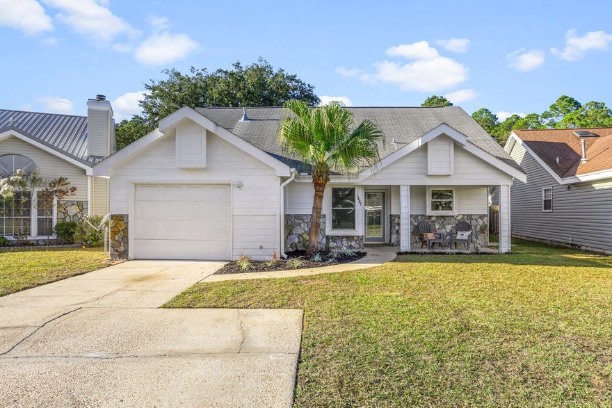 Welcome home to the cutest cottage in Fort Walton under 300k. A home warranty is included in the sale making this property very low maintenance! Fantastic curb appeal makes this desirable home even more charming! Step inside to a newly painted home in a perfect neutral suitable for your home decor. The main living area has tall ceilings and a cozy fireplace with low maintenance tile throughout. The open concept kitchen features mostly stainless steel appliances and granite countertops. The master with vaulted ceilings makes the space feel more grand and your own oasis. The master bathroom features a double vanity sink, and large jacuzzi tub. Washer, dryer and garage fridge included in the sale. Fenced in backyard.