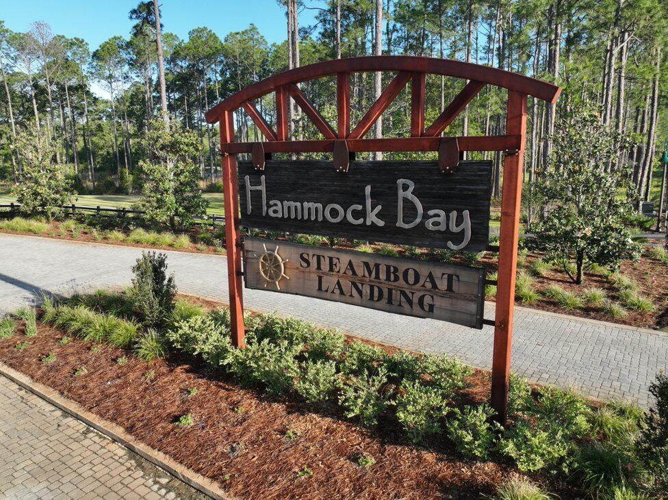 BUILD YOUR DREAM HOME IN THE STUNNING WATERFRONT COMMUNITY OF STEAMBOAT LANDING! Lot 20 backs to preserve. Craft Your Slice of Paradise on this Exquisite Wooded Lot. Take leisurely strolls along the boardwalk leading to the fully-built Bayfront clubhouse, now open and available for all residents to enjoy. Savor breathtaking sunsets and bask in the beauty of Choctawhatchee Bay from the 500 ft dock--an experience that's right at your doorstep.