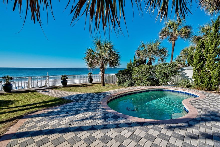 This idealistic beach front estate perfectly embodies old florida charm paired with captivating gulf views and strategically constructed well above sea level in Flood Zone X with concrete block siding providing longevity & peace of mind. This gorgeous property consists of .59 acres of land with 50' of private beach & ample room for parking; masterfully configured to maximize rental income (Owner will guarantee $220,000 in gross annual income for the 2016 rental season) with 6 bedrooms as well as a separate guest quarters providing optimal functionality. Notable features include a privately gated entrance, exceptional parking ability with room for 8 vehicles, private in-ground pool area presiding over an incredible gulf front vista & beautifully landscaped