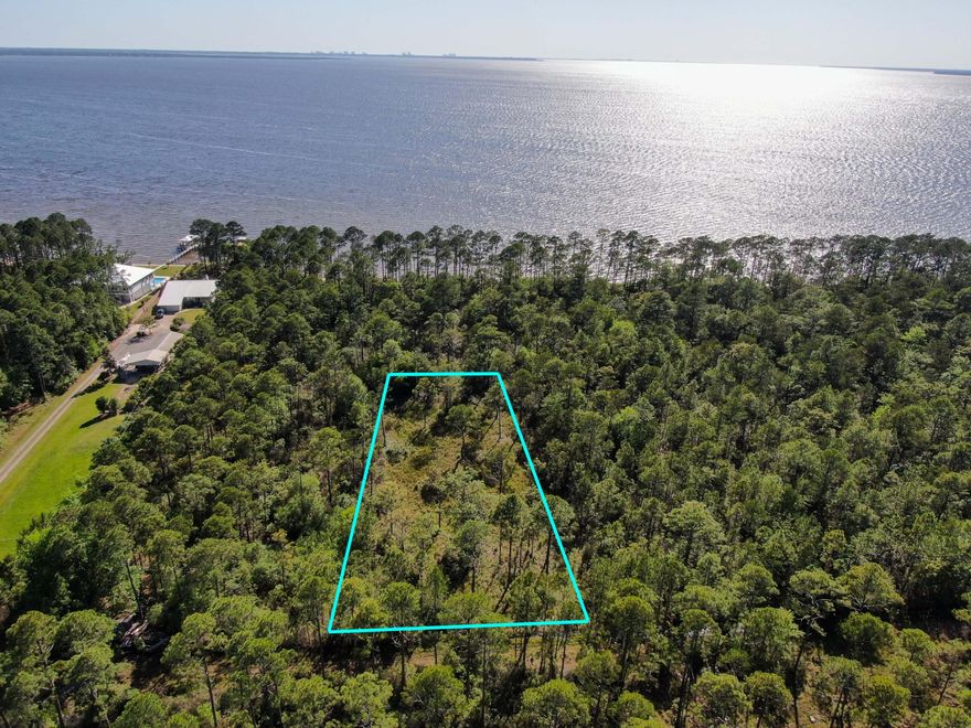 Are you looking for land near the the bay in Freeport this property is only one lot off of the Choctawhatchee bay! This is a large .69 Acre lot waiting for your new home. Land has been surveyed and under brushed in November 2021. This land is in a very secluded area. Survey and plat map are in the documents section.