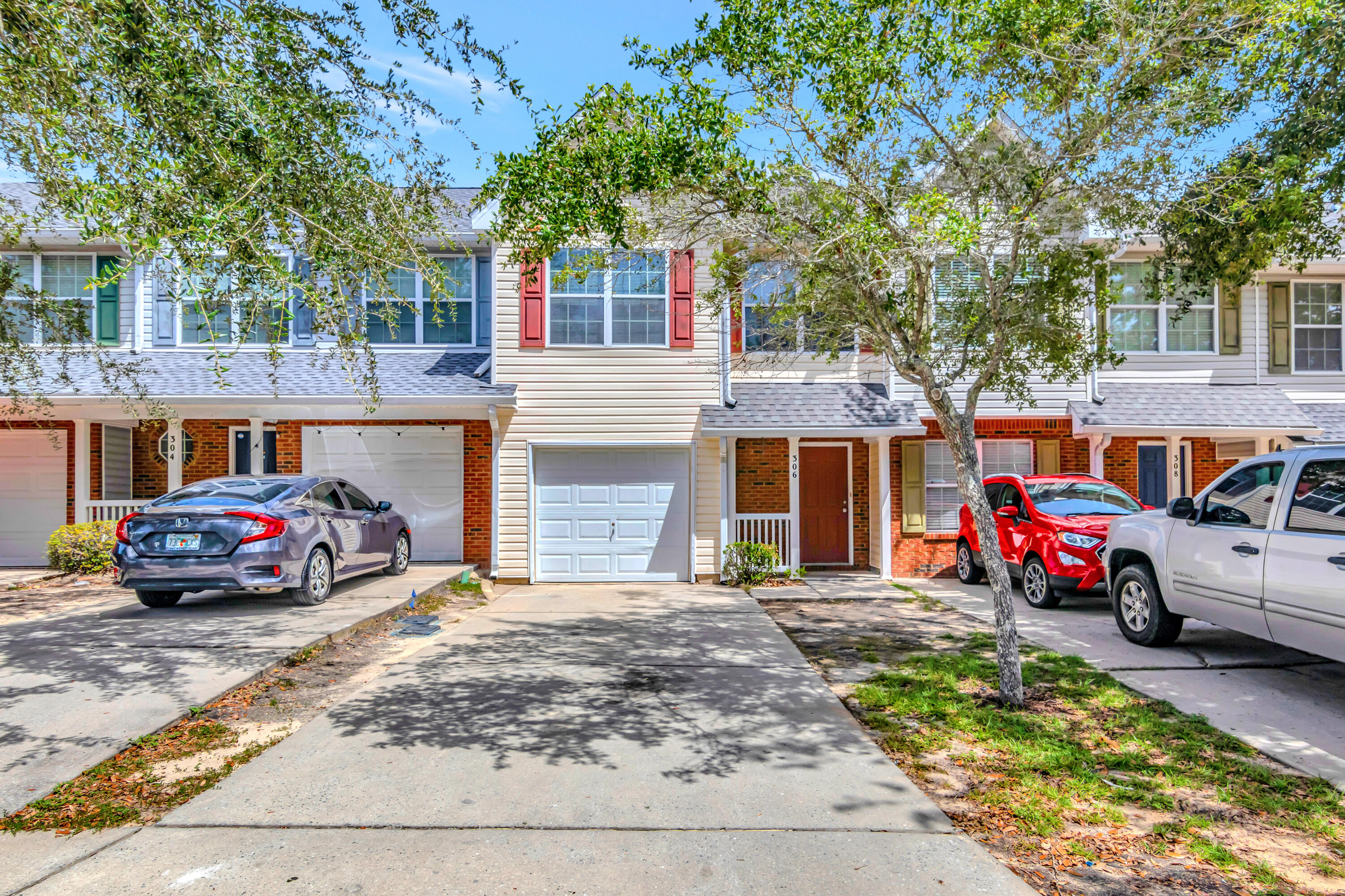 Is this your new home? Come take a look! This charming 3-bedroom, 2.5-bathroom townhome in Rolling Pines Subdivision is located in the heart of Crestview. This property offers a sizable 1-car garage, nearly 1,500 sq. ft. of spacious elegance and offers great room for indoor and outdoor entertainment. This residence embraces a generous floor plan as well as low HOA. New roof and water heater have both been replaced within the last year. This unit makes an excellent home for first time homebuyers, and is also an excellent investment opportunity with great rental history. The home is situated in a convenient, friendly neighborhood with outstanding schools and is an easy commute to military bases, beaches and shopping. Don't miss out on this opportunity!