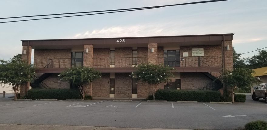 2nd floor office with large open area as you enter, private offices, and 2 restrooms.  Front and rear entrance with front and rear parking.  Across the street from Publix and the new Aldi's.