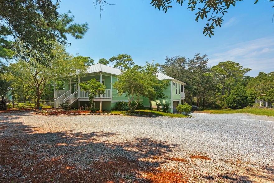 Lakefront property at it's best! Own your own sanctuary. This .8 acre lot is one of a kind in Santa Rosa Beach. Bike or golf cart to beach or walking distance to the trail head that leads into the forest. From the moment you walk in, the open floor plan, stunning wood floors and the array of windows captivate your attention. Leave your worries behind as you are lured to the charming screened porch overlooking the lake. Enjoy your morning coffee or a breathtaking sunset as you take it all in. The kitchen with all it's beautiful oak cabinets is a chef's dream, perfect for entertaining. The two-sided fireplace offers cozy warmth from both the living room and master bedroom. Also in the master bedroom is the largest walk-in closet you have ever seen! The 1000 square ft of storage below for an awesome woodworking room or that extra storage space everyone needs. Participate in local activities, enjoy the many restaurant options along 30A, or simply take a stroll along the beach. For the more adventurous, you are within walking distance to biking, walking, and running paths. Build extra square feet on this large lot or add a cool and relaxing pool for those steamy summer nights. The endless amenities of this lakefront home, the captivating view, peace and serenity of the quiet location can be your new dream home!  