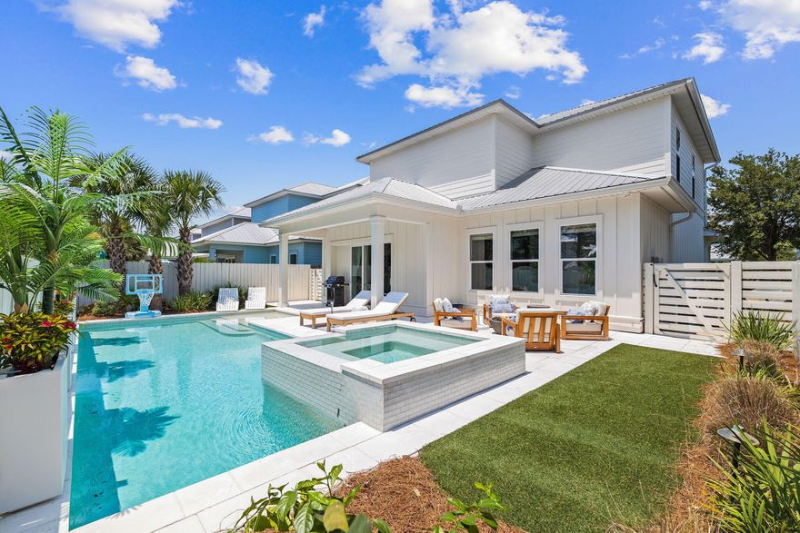 At 21 Mikken Lane, come experience the unique 30A Gulf Place Retreat community. You see a beautiful 4-bedroom, 4.5-bathroom home with an exquisite, exclusive outdoor living space as the gem of this 30A property...an entertainer's dream featuring a fire pit, a sparkling pool and a delightful hot tub. This home is rental-ready but has served as a second home for the current owner. The interior is impeccable and will provide a wonderful escape for your ideal beach-vacation home. The open-concept features a modern kitchen with granite countertops, and a spacious master suite inviting you to enjoy the fullness of 30A. Just blocks from Gulf Place and the Ed Walline Beach Access, this is perfect blend of relaxation and convenience on the vibrant 30A corridor. Step into your new paradise!