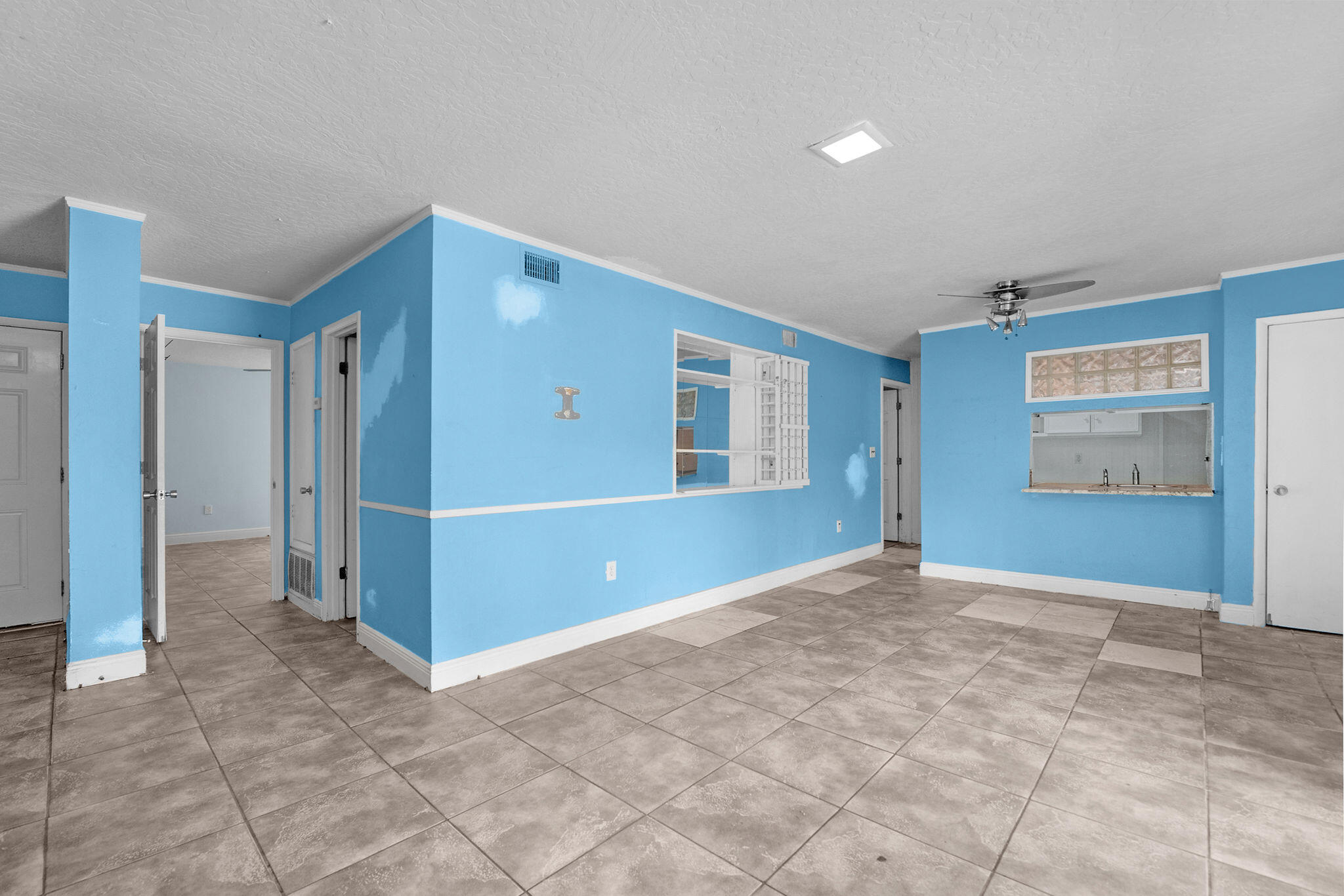 INVESTOR SPECIAL. Two large bedrooms, 2 updated bathrooms and tons of potential! Solid floors throughout (tile and laminate); no carpet! Kitchen has views into the open living space. Lots of natural light coming in from the glass doors leading out to the covered patio. Conveniently located between both Eglin AFB and Hurlburt Field and just a short drive away from the white sand beaches of the Emerald Coast. Schedule your showing today.