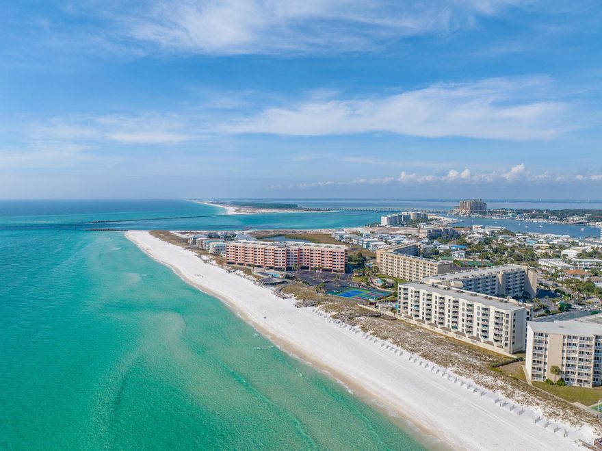 Fully remodeled and absolutely stunning, this condo has been transformed into a coastal dream! The new kitchen features sleek appliances, an ice maker, and a drink fridge--perfect for entertaining. Both bathrooms have been beautifully upgraded with modern fixtures and luxurious finishes. Enjoy stylish touches like new light fixtures, washer/dryer, wet bar, and electric fireplace. Step out onto your spacious balcony to take in beautiful Gulf views! Resort amenities include a Gulf-front pool, beach chair service, NEW pickleball/tennis courts, gym, large owners storage unit, covered garage parking.. even owner boat parking!! Whether for a beach retreat, full-time residence, or turnkey rental, this condo has it all. Don't miss out--schedule your showing today!