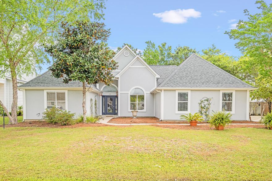 Beautiful home in a quaint gated neighborhood of Pelican Bay! This community features a park with bay access, dock, tennis courts, and basketball court! This home features a brand new architectural roof, high ceilings, spacious bedrooms, hardwood floors in the living room, a ventless gas fireplace, large jacuzzi tub, and large fully fenced back yard that's big enough for a pool!