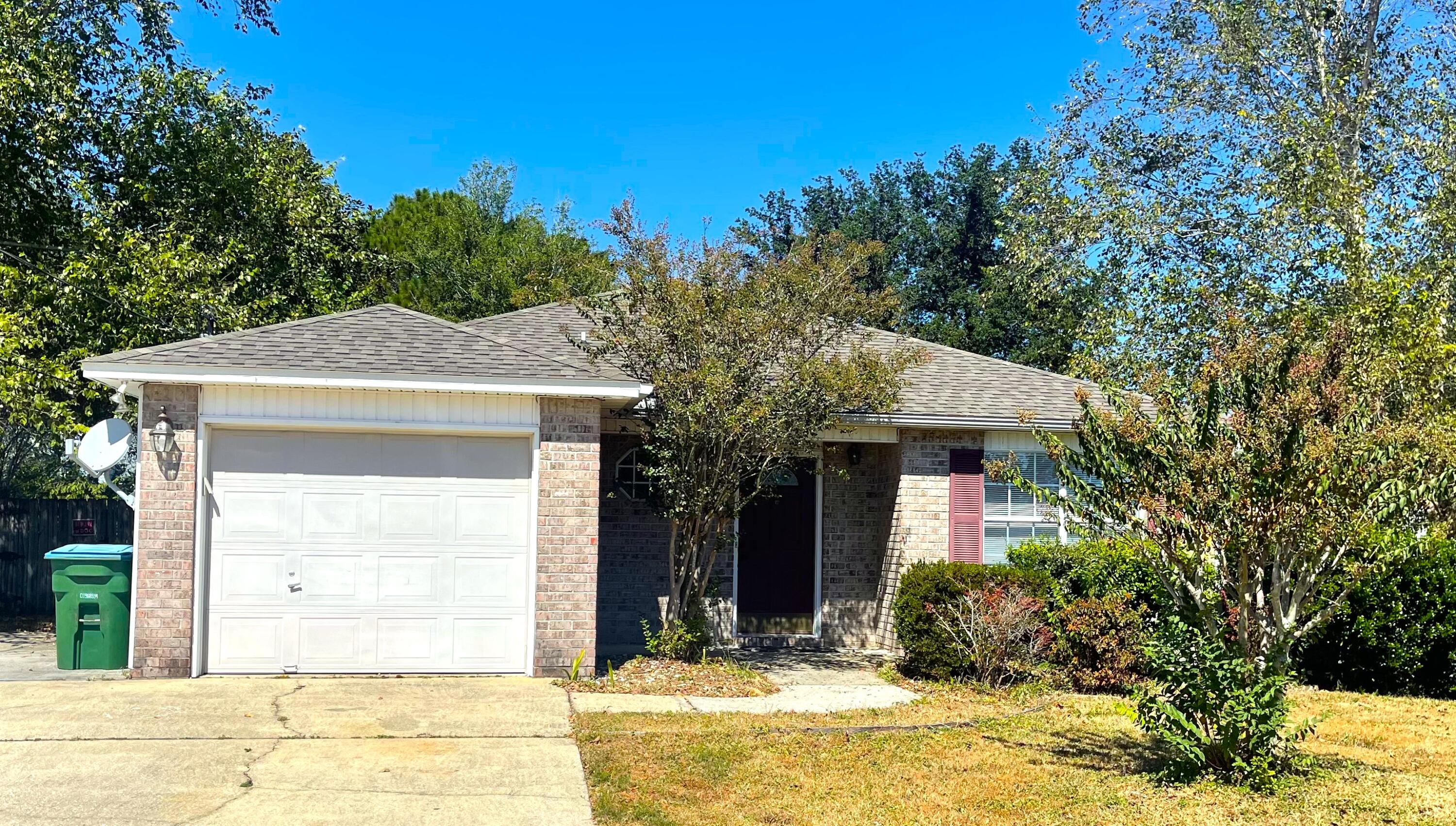 South of interstate 10 (I-10) This 3 bedroom 2 bath open floor plan is waiting for you and your family. This property is pet friendly and comes with a fenced in back yard for your fur babies safety. Tile and laminate in all the main areas. Carpet in the two smaller bedrooms. Large eat in kitchen with lots a cabinets for storage, breakfast bar, and pantry. Owners suite comes complete with walk in closet. Small concrete patio for entertaining family and friends.