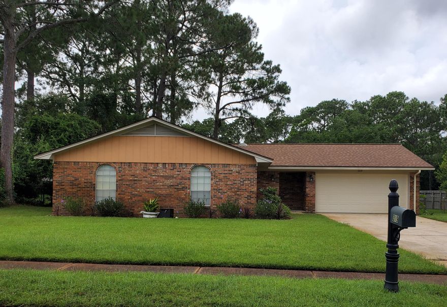 Welcome Home!  This 3 bedroom 2 bath all brick beauty is nestled on a picturesque corner lot in the highly desirable community of Northgate!  Just minutes to Hurlburt Field AFB, Eglin AFB, shopping, schools and the world's most beautiful sugar white beaches!  Step inside to a bright, open floor plan with tile flooring in all living areas, a spacious great room with cathedral ceilings along with a separate family room.  Renovated  kitchen sports gorgeous granite, upgraded cabinets and stainless appliances including built in microwave.  Beams of natural sunlight pipe through the multiple skylights.  Enjoy a Sunday barbeque protected from the bugs in the large screened in back patio overlooking the spacious, meticulously manicured back yard.  You will love the Northgate community and all