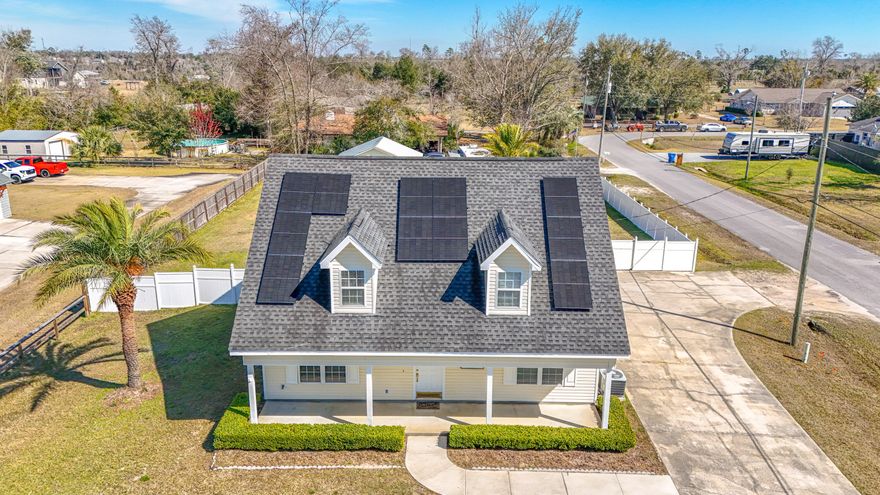 Welcome to 4108 Transmitter Road, a beautifully maintained Craftsman-style residence nestled in the heart of Panama City. Set on an expansive .48-acre lot, this 3-bedroom, 2.5-bathroom home offers timeless character, thoughtful updates, and exceptional versatility -- all in a central location convenient to shopping, dining, schools, and daily essentials.From the moment you arrive, the home's inviting curb appeal stands out, highlighted by freshly painted exterior eaves and columns and classic architectural details. Inside, warm Craftsman charm meets modern comfort with a functional layout ideal for both everyday living and entertaining. The upstairs interior has been freshly painted, creating a bright, refreshed atmosphere ready for its next owners.The nearly half-acre homesite provide rare space and flexibility. Whether you envision lush landscaping, an outdoor entertaining area, or the addition of a pool, the backyard offers plenty of room to design your ideal retreat. A standout feature is the impressive 24 x 34 detached shop -- perfect for hobbies, storage, a workshop, recreational equipment, or even a home-based business.

This home also delivers valuable upgrades and long-term peace of mind. Energy-saving solar panels help reduce utility costs, while major improvements include a new roof installed in December 2018 and a new HVAC system added in 2021. The property is serviced by a well and septic, with the septic tank pumped one year ago and a new well filter installed in 2021.

Blending classic style, modern updates, and exceptional outdoor space, this property offers a rare opportunity to enjoy comfort, functionality, and future potential. If you're seeking a centrally located home with character and room to grow, this Panama City gem is ready to welcome you home.