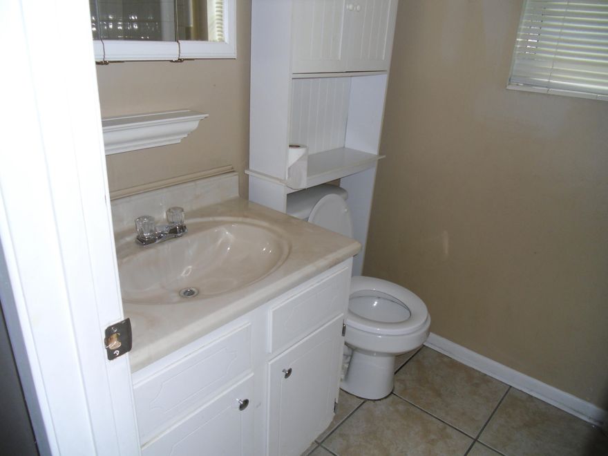 This gorgeous home is situated in the Green Acres Area. Three bedroom two bath home, is spacious with a large back yard and a screened in patio. For your viewing today please call the office.