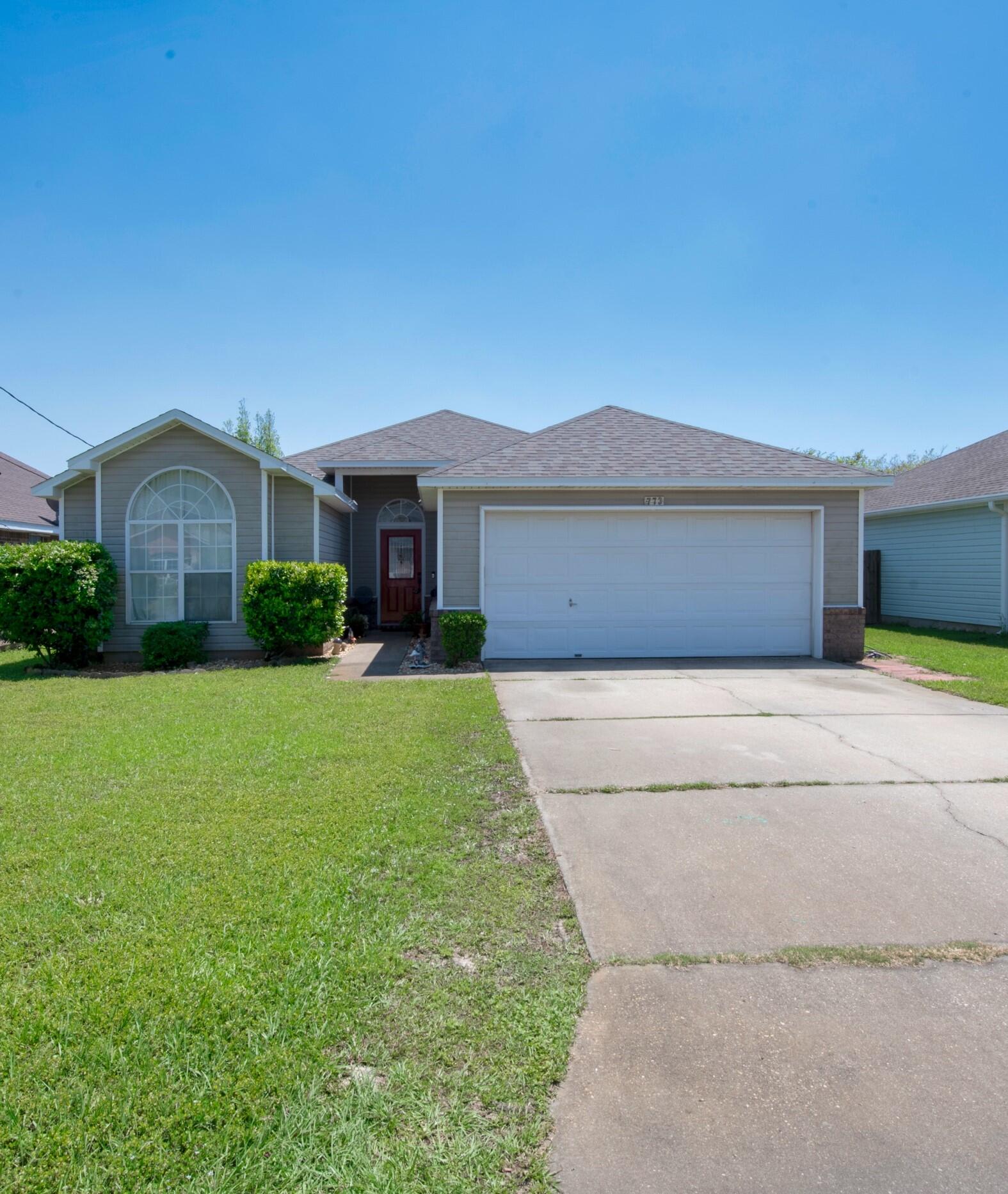 Well kept home featuring newer roof (less than one year old), upgraded wood look tile flooring, open floor plan, 3 bedrooms, fully fenced yard and more! Well sized primary bedroom offers a walk in closet, garden tub, separate shower, double sinks, and access to the back porch! Large living/dining space is perfect for entertaining. Home also has a separate breakfast nook area! Close to beaches, Hurlburt Field, and shopping!Schedule a walkthrough today!