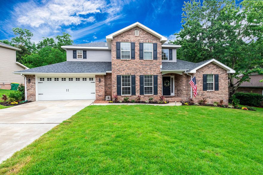 This is it!!! This 4 bedroom home has been remodeled from just about the top to the bottom!!! You will love the light and bright living areas with a cozy gas fireplace, eat in kitchen, and a bonus area to use as an office or formal dining area. The kitchen dazzles with new quartz counter tops and tumbled tile backsplash, a gas stove to make the chef happy, and a walk-in pantry. The layout is great with the master suite (including a fresh, new, modern bathroom) on the first floor. All the other bedrooms (two of three were just painted) and a full bathroom are upstairs. And, if you are looking for a private retreat, look no further than your own double tiered back decks tucked into the trees. Close to A+ schools too! Roof, sod, and landscaping are brand new as well! Video Tour avail.