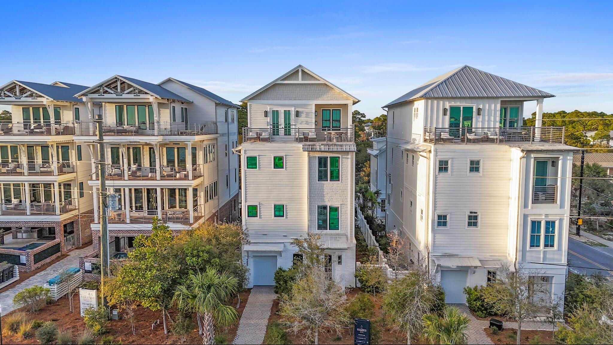Presenting an extraordinary opportunity to own a coastal sanctuary offering refined luxury and effortless beachside living. Ideally situated just steps away from the pristine sands of San Juan & Santa Clara Regional Beach Accesses, this exceptional residence combines high-end design with inviting coastal charm. Located on the renowned Scenic Highway 30A, providing easy access to local dining favorites, and Seaside, FL, the epicenter of 30A. This impressive 7,037 sqft home features 8 bedrooms, 7 and a half bathrooms, providing ample space for family and guests alike. Set within a non-HOA neighborhood, the home offers the perfect balance of convenience and accessibility. Boasting Gulf views and a thoughtfully designed layout, this home offers a private retreat ideal for both relaxation and entertaining. Expansive outdoor living spaces include a private pool with a sundeck, plush lounge seating, and a covered patio featuring a built-in grill and al fresco dining area. The elegant pool is lined with pavers and palm trees, as well as a privacy fence. The pool can be heated seasonally for added comfort during cooler months.



The gourmet kitchen is a chef's dream, featuring a gas range and custom-built vent hood, complete with top-of-the-line appliances, granite countertops, and an oversized island perfect for gathering. Designer details and coastal-inspired finishes flow throughout the home, which features engineered hardwood flooring in the main living spaces and tile in each bathroom, enhancing the light-filled interiors.



The main house offers multiple living spaces, including a game room with a game table and lounge, as well as furnished balconies with Gulf views. For added convenience and privacy, the separate carriage house features two bedrooms, a full bath, a cozy living area, and a well-equipped kitchenette  ideal for guests or multi-generational stays.



This remarkable property offers the perfect blend of coastal elegance and modern convenience, making it an exceptional opportunity for those seeking a luxurious beachside residence.

