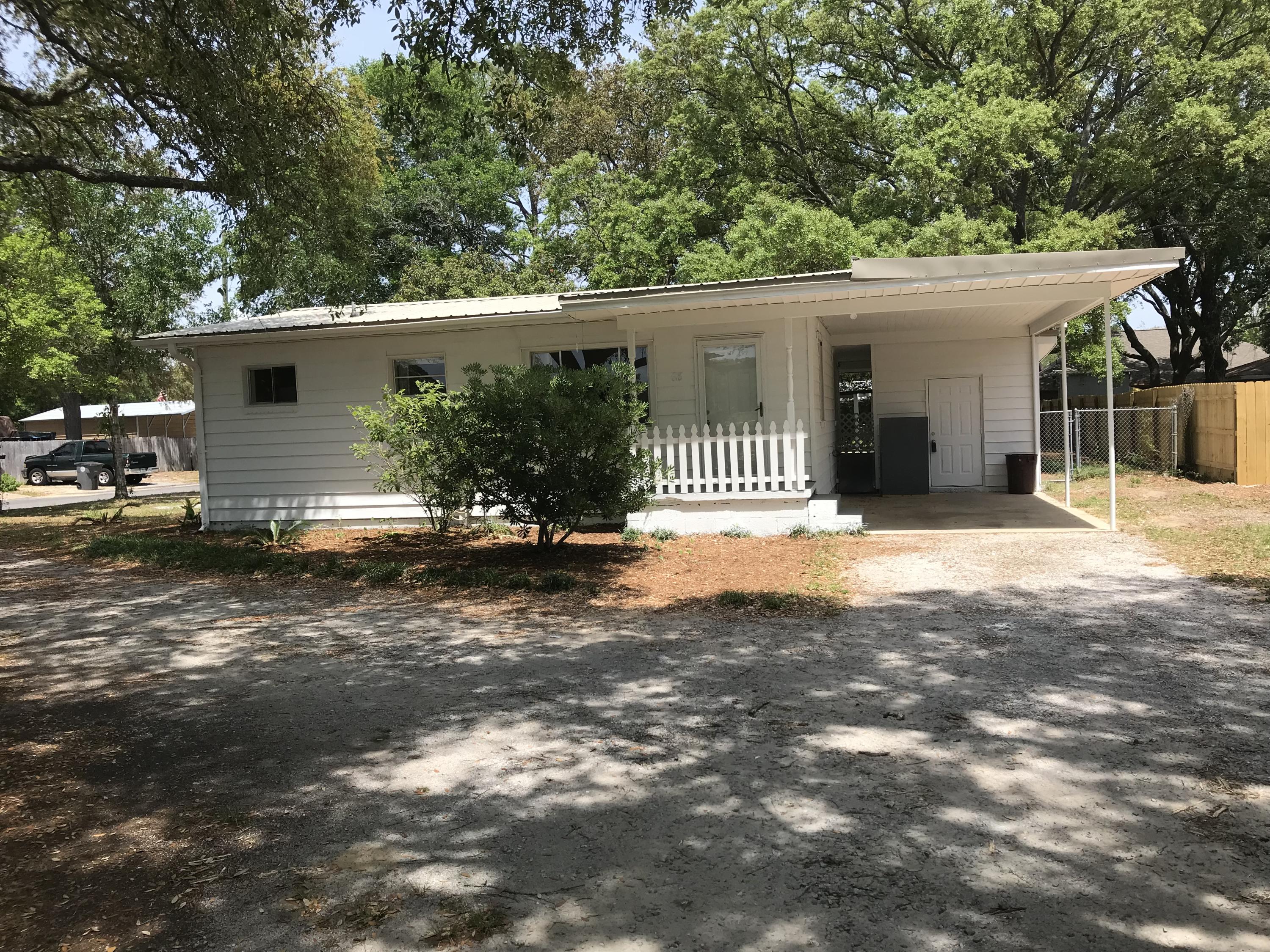 LITTLE HOME...LOTS OF POSSIBILITIES!! The Home Is Centrally Located on a Quarter Acre Corner Lot. Access From Two Different Streets! Plenty of Room to Park Your Boat or RV. The Interior has Hardwood Floors and an Open Floor plan in the Main Living Area. The Kitchen Area has Recently Been Updated. Two Bedrooms and a Bath With a Back Porch Area Complete this Home. The Backyard is Fenced. And the Roof is Newer (2013) Buyer to Verify all Measurements.