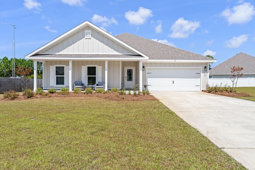This stunning almost new 2022 one story with Bay access is just what you've been looking for. Featuring 4 oversized bedrooms, 2.5 bathrooms, an impressive living room with view of the lake, a dazzling open kitchen with a large island, casual dining space, and endless storage. Enjoy the Florida breeze with the covered front porch, covered back patio and fantastic fenced backyard. This great split floor plan offers wonderful storage, granite counters, EVP floors throughout, brushed nickel fixtures, crown molding, stainless steel appliances, and sprinkler system. Included in the HOA is access to the Bay for you to enjoy kayaking, paddle boarding, fishing, and more. Located by hospital, 30A Beach access, Grand Boulevard shopping, and Topsail Hill Preserve State Park. Move in Ready.