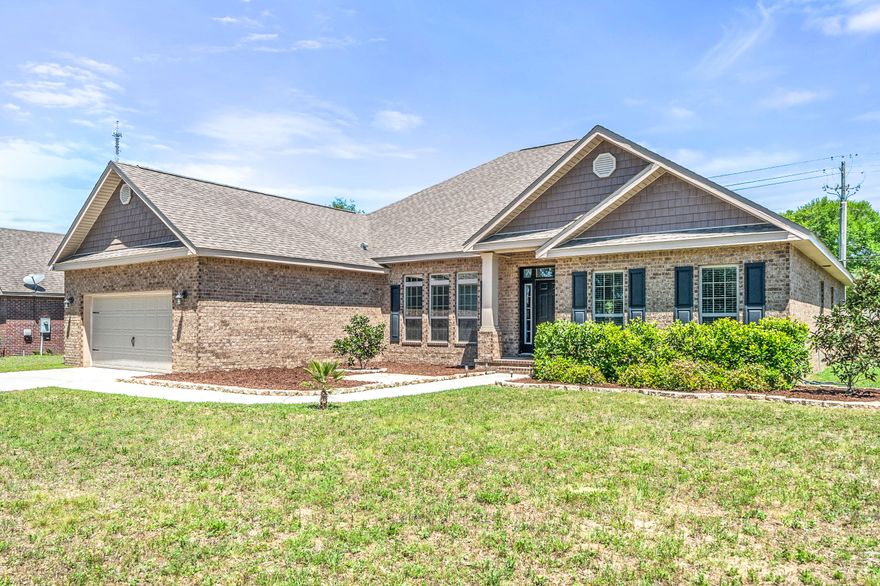 Your search for the perfect floor plan has ended! This stunning, open concept home is located on a large corner lot with a privacy fenced back yard. Home not only has 4 bedrooms but also a study/office/flex room and an open formal dining room with arched, classic columns separating it from the spacious family room perfect for entertaining guests. Double trey ceilings enhance the dining room, master bedroom and family room. The stylish kitchen has tile flooring, stainless steel appliances and granite counter tops with a back splash that compliments the cabinets . Breakfast bar provides room for additional seating. Want a large master bedroom? You won't feel cramped in this one which measures 15' x 24'. Plenty of room for a desk or seating area and large furniture.