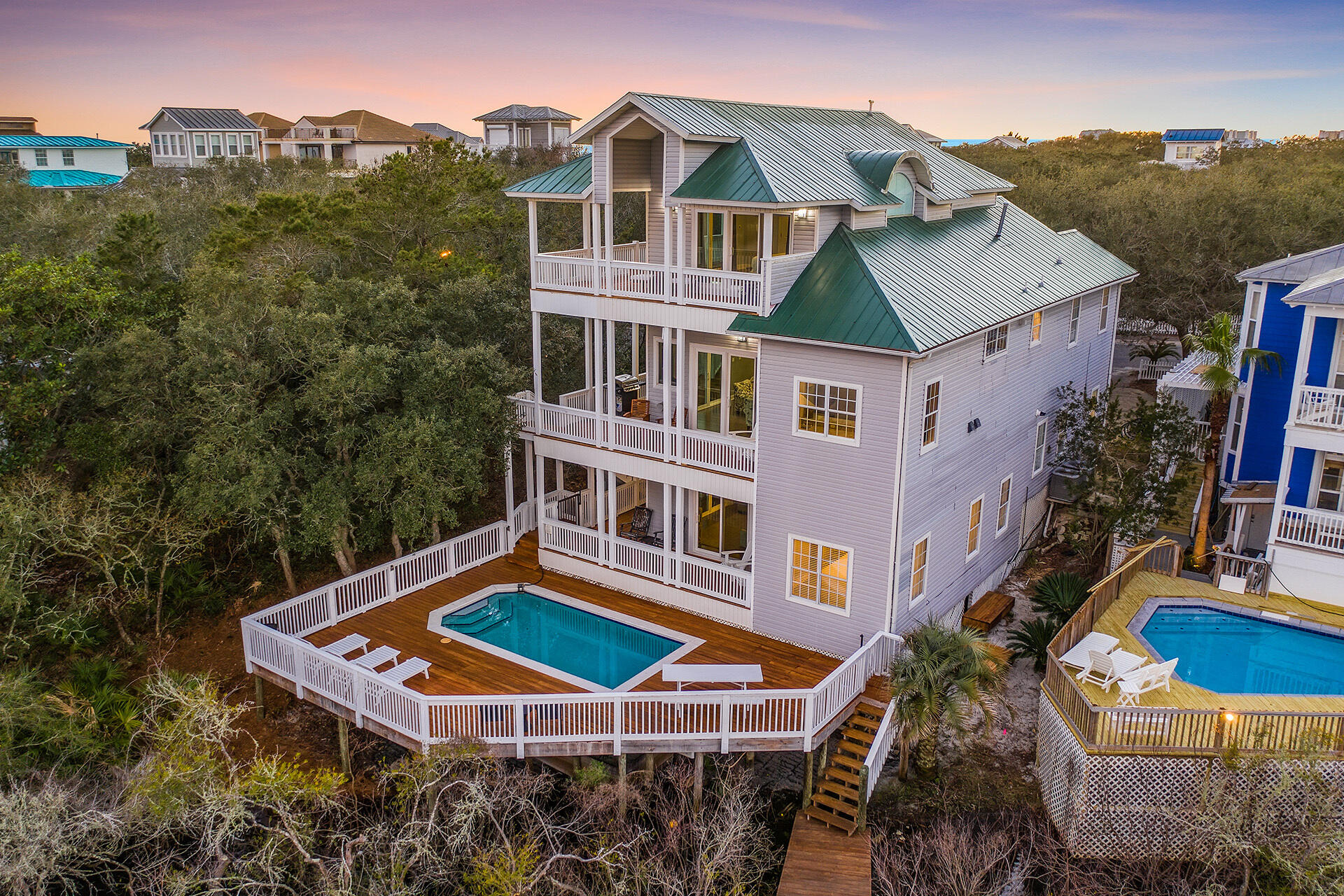 Fantastic Investment Opportunity!Beautifully furnished 5-bedroom, 6-bath home with 3 bunk areas, a private pool, and a lakeside dock in the sought-after Kokomo Kove community of Crystal Beach. The gourmet kitchen features high-end appliances, including a Viking stove and two dishwashers. Designed for gatherings, the home offers two living areas, a spacious dining room, and three wraparound balconies with tranquil lake views.Relax by the pool, fish off your private dock, and enjoy parking for five. Sold furnished (with a few exceptions); golf cart negotiable. Kokomo Kove offers private beach access and is close to Destin's top dining and shopping.