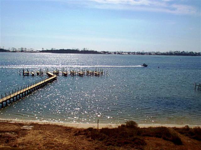 Intercoastal Pointe is a gated residential condominium directly on the beautiful Santa Rosa Sound (Intercoastal Waterway) with only 35 waterfront units and 5 town homes on the grounds. Unit 405 includes a 20'x12' boat slip and is on the 4th floor. This unit has wonderful, unobstructed views of the Sound with views of the Gulf of Mexico over Eglin's barrier island. Sit back and watch the boats and dolphins jump and enjoy sunrises and sunsets from the spacious waterfront balcony/terrace, which is off the living area and the master bedroom. It is just minutes from Fort Walton Beach, Destin, Navarre, Eglin AFB and Hurlburt Field. This quiet complex sits well off the road, is high and dry and hurricane screens have been installed. The kitchen isopen to the dining and living area - all with