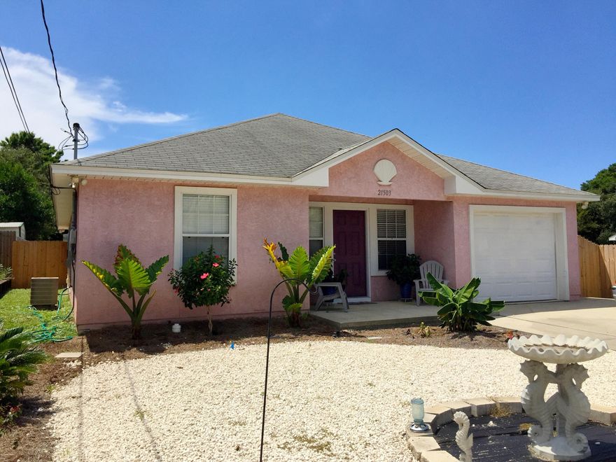 This Riviera Beach 3 bedroom 2 bath home has been completely renovated and is a must see in person to truly appreciate. This is a split bedroom plan with 2 bedrooms and a bath on one side and 1 bedroom and bath on another side. This home features an open floor plan and an addition dining area that can be used as a den or an office. A sweet beach community four blocks to the sugar-white sand beaches. Don't miss out on an opportunity to call this gem ''Your home''