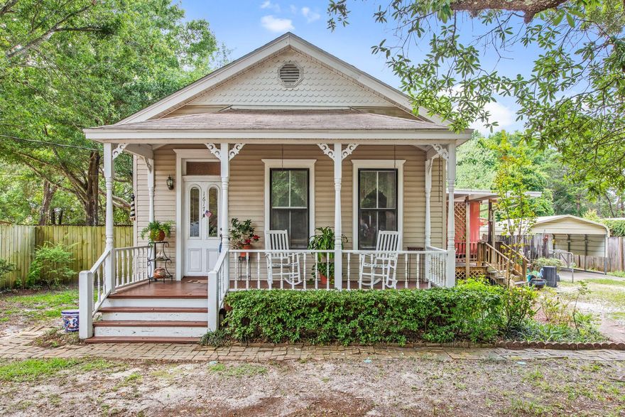Big Price Improvement!!!Absolutely charming Florida Cottage that was built in 1935 but has an effective date of 1985 per county records. This historic home once sat in the Seville Square area of Pensacola and was moved to its current location in 1973. From the covered front porch you will enter the quaint foyer with a transom window and to the right is the living area with beautiful original woodwork that will take you back in time. Enter the spacious eat-in kitchen with newer cabinetry and appliances, and French doors to access the large, covered wood deck. Past the kitchen is a den or sitting area with the master bedroom off of it. The two guest bedrooms are in the back of the home. This home boasts of another era with the woodwork, large windows, charm, and unbelievably high ceilings but with all the modern conveniences. Water Heater was replaced December 2022, HVAC 2021, and seller will replace roof with acceptable offer before closing. 200 AMP service and all copper wire. Septic was completely replaced in 2007 complete with drain fields. 
All information deemed accurate. Buyer to verify.