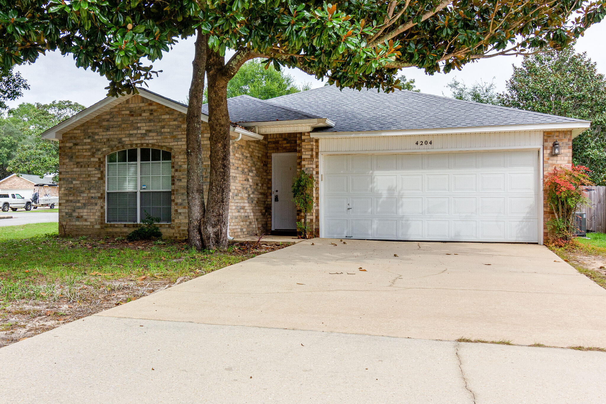 This 3 bed/2 bath home with an office home feels even larger due to the open floor plan and cathedral ceilings. The kitchen/dining/living area are completely open to one another. Wood look ceramic tile in all bedrooms, study, hallways, and living/dining/kitchen areas! Two bedrooms and a guest bath are on the left when you enter the home followed by the study/office area. The master bath offers double sink vanity, garden tub and two walk in closets. Large fenced in backyard with an open patio. Living room features a wood burning fireplace and is perfect for entertaining or large family gatherings. sorry no indoor smoking and no pets.