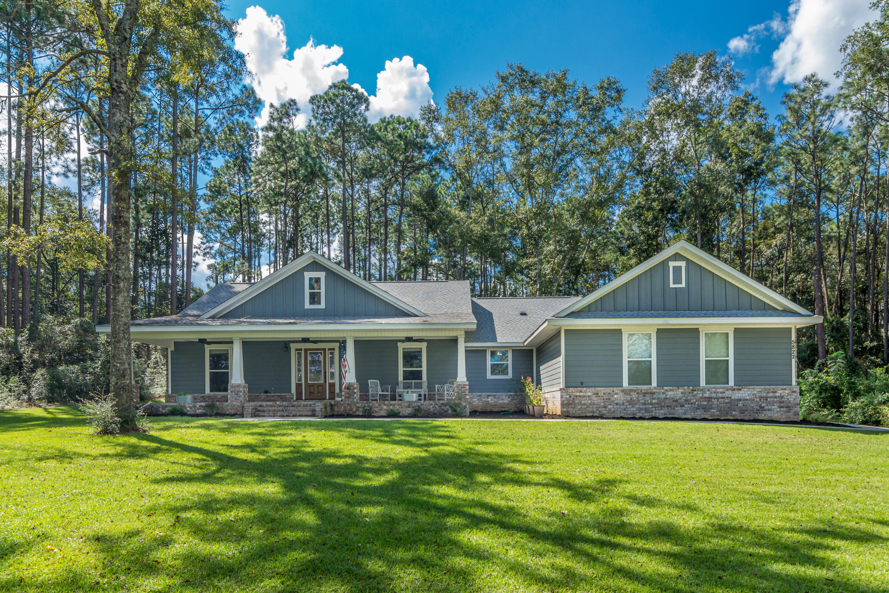 Welcome home to this like new custom-built home with .78 acre of country living just minutes from town with no HOA. From the beautiful and expansive front porch to the farmhouse doors inside, the upgrades and attention to detail in this home are sure to impress. Boasting a split, open floor plan with 5 bedrooms (or could be 4 bedrooms with flex space), 2 1/2 bathrooms, you're sure to have ample room to entertain throughout. The kitchen features stainless steel appliances with gas range, a large walk-in pantry, and a large breakfast island. Stepping out back you can enjoy the serenity of the covered patio looking out into your private backyard. Parking is no concern with a side entry oversized garage and an extended driveway. Schedule your showing today!
