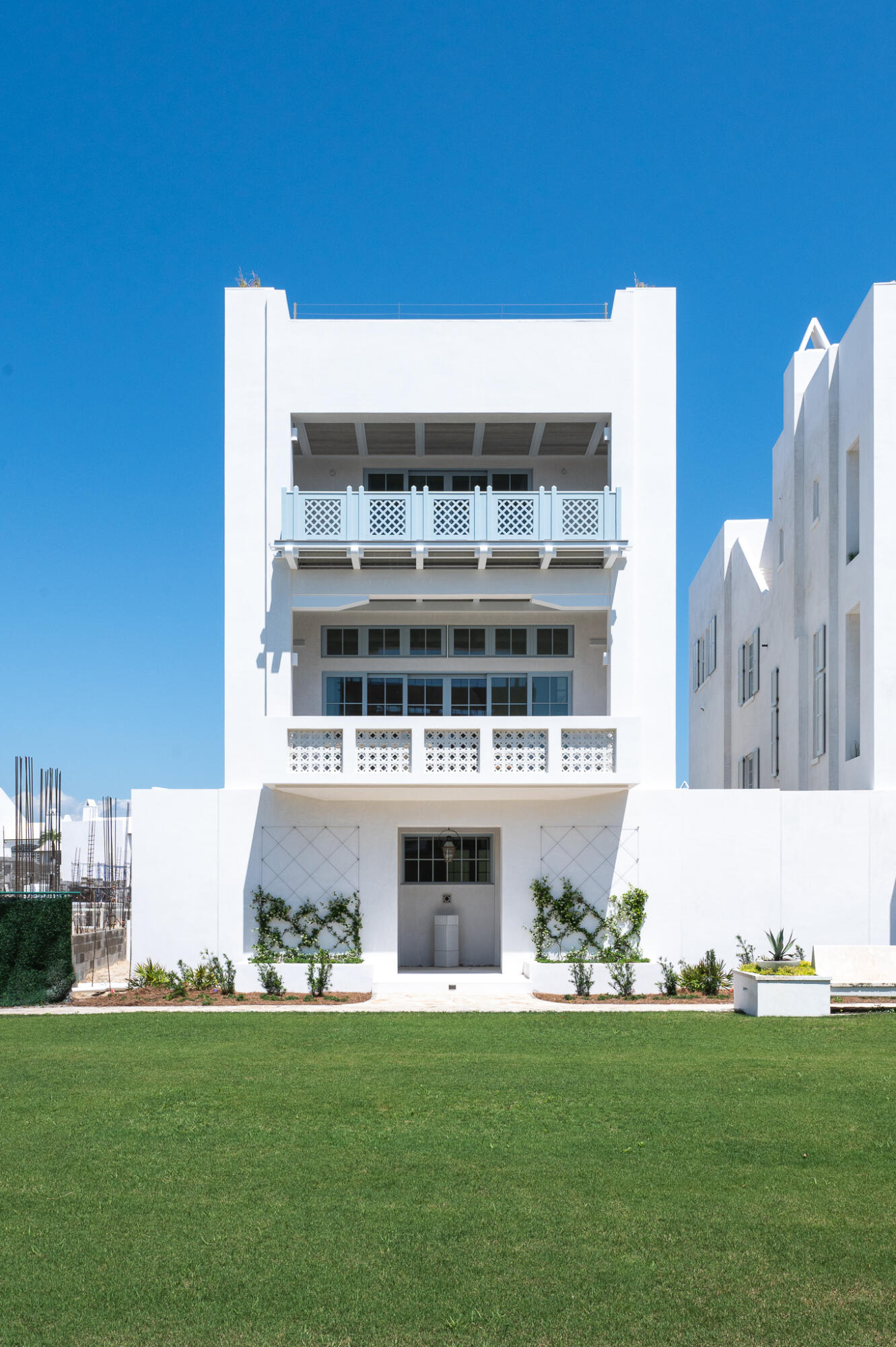 Welcome to the epitome of luxury living at Alys Beach, Florida. Nestled within the master-planned new urbanism development, this meticulously designed five-bedroom home boasts unparalleled elegance and sophistication, located on the coveted Bela Gray Green, with permanent Gulf of Mexico views. Spanning 4,481 square feet, this newly built residence exudes modern charm and architectural brilliance. Step inside to discover a seamless fusion of style and functionality, where every detail has been thoughtfully curated to create a haven of comfort and refinement. Custom interior design by Bohlert Massey Interiors elevate the master bedroom and main living spaces. Featuring five bedrooms, there's ample space for relaxation and entertainment. The heart of the home is the gourmet