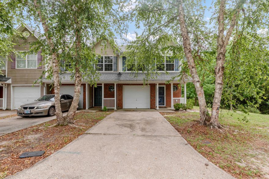 Quiet, end unit in last building on this cul-de-sac/dead end street overlooking a natural area. Newer cabinets and granite in kitchen. Black appliances and built-in microwave. This 2-story town house is near schools, medical facilities and shopping...Just a short drive to our military bases and beaches. You will appreciate this floor plan with 3 bedrooms and 2.5 bathrooms. Master with his/hers vanities and closets has vaulted ceiling. Full size washer and dryer convey. One car attached garage is complete with painted walls and auto garage door opener. Notable: carpet/paint 2023, Roof 2021, HVAC 2019 (coils again 2020), cabinets-granite-patio french doors 2018.