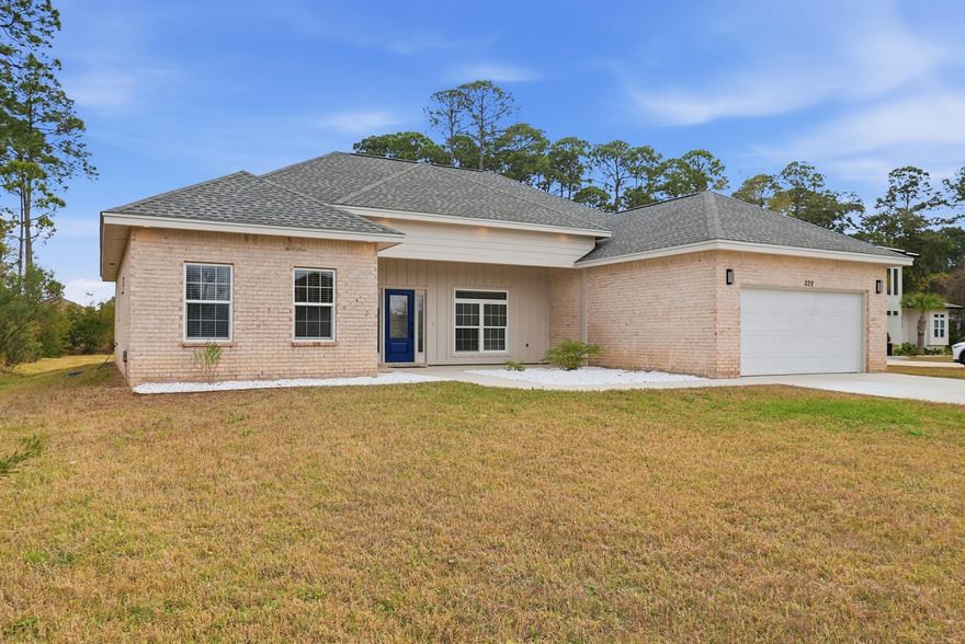 Welcome to one of the finest homes in Driftwood Estates! This stunning 4-bedroom, 2-bath brick home was built in 2020 by Carrot Top Designs, and features all the latest modern finishes and upgrades, thoughtfully designed layout, and one of the best parts -- a huge backyard full of possibilities, with NO HOA! This home truly checks all the boxes. In the heart of Santa Rosa Beach, it is rare to find a home of this caliber, on this large of a lot. Stepping in, you are welcomed by the expansive living room with raised ceilings, flowing seamlessly into the dining area and kitchen, creating the perfect space for special moments and gatherings with loved ones and guests. The home includes brand new luxury vinyl plank flooring installed and warrantied by Renovation Flooring, that runs throughout the entire home, adding style and durability. 

The beautifully appointed kitchen showcases white quartz countertops, custom soft-close cabinetry, a pantry, and ample counter space for meal prep and hosting, and comes equipped with all stainless steel appliances. The master suite offers a peaceful retreat with a large walk-in closet, double vanity, and a large walk-in shower. 

The backyard, offers plenty of space for fun, leisure, and even a future pool or outdoor kitchen while enjoying the outdoors. The first two guest bedrooms are on one side of the home offering privacy with their own shared full bathroom, while the other guest room is towards the front of the home, and can be used for a variety of purposes such as an office or bedroom. All bedrooms come with custom closets! 

This home sits on just over half-of-an-acre lot, and one of the best parts, is that you can see the bay from the living room, and there's NO HOA, so the sky is the limit with what you can do! Just down the street, you'll have access to one of the largest parks in Walton County: The Driftwood Estates Park, featuring walking paths, pavilions, soccer/baseball fields, basketball, pickleball, tennis, and racquet ball courts; and, has restrooms and a playground as well. 

Nearby the best restaurants, shopping, schools, entertainment, and of course, beaches, that South Walton has to offer! 

The home was also refreshed, and renovated, and comes newly painted, with a new oven and water heater just installed, and also comes with all kitchen appliances, and a washer and dryer all you have to do is move in, and make it your own! 

Don't waitthis one won't last long! Make an appointment asap to check it out! All dimensions and information herein is deemed reliable, but should be verified by buyer.