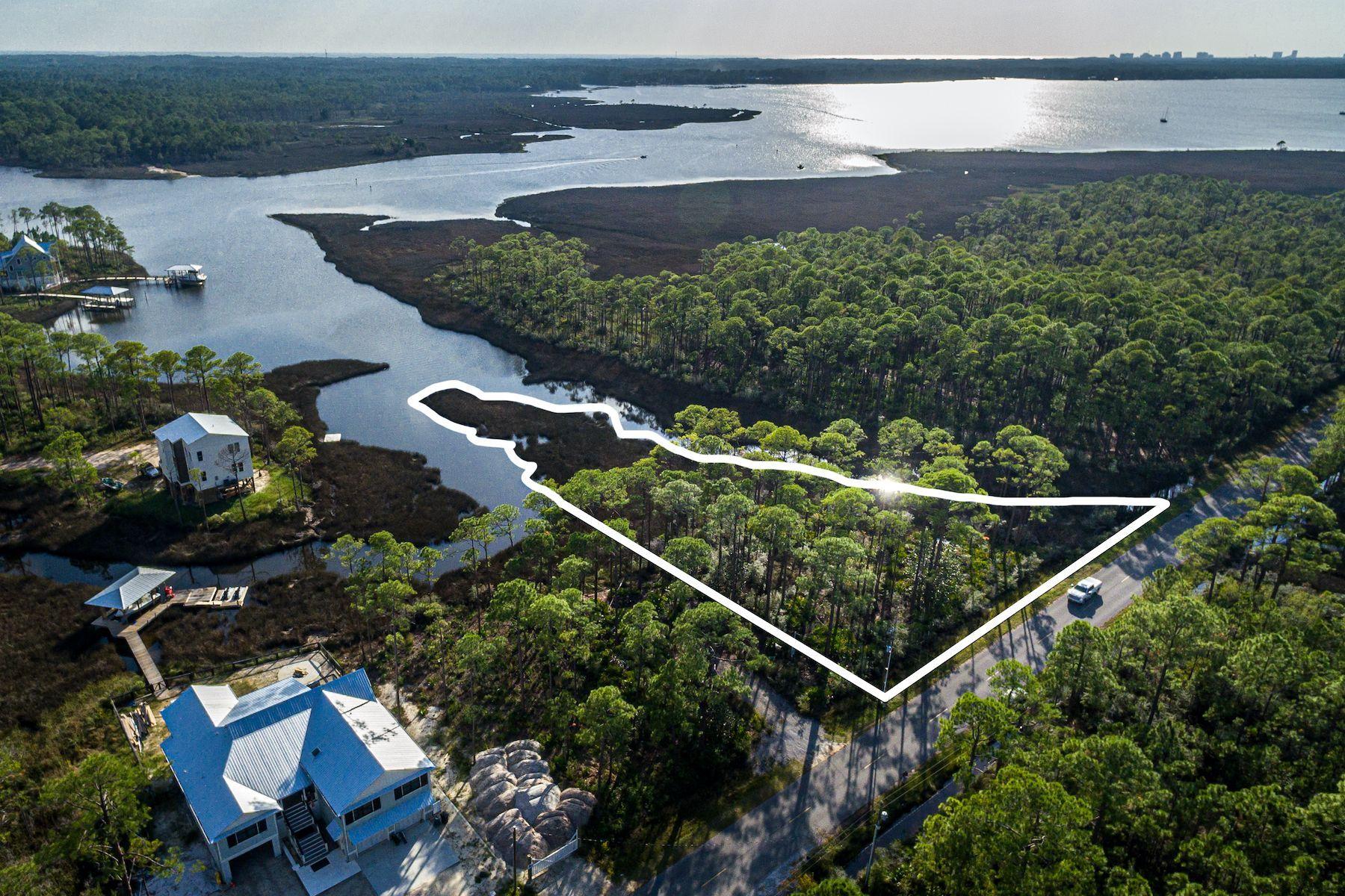This is a unique opportunity to build a custom waterfront home on Hogtown Bayou in Santa Rosa Beach. Hogtown Bayou conveniently connects to the Choctawhatchee Bay and the Intracoastal Waterway east to Panama City Beach and West to Pensacola Beach. The property is just over an acre and includes a plan for a boardwalk, dock and boat slip. Surrounded by water on three sides, create your dream home on this expansive lot with no homeowner's association and plenty of potential for enjoying scenic water views. Conveniently located just off Highway 393 North, beautiful Gulf of Mexico beaches are just a quick drive away.