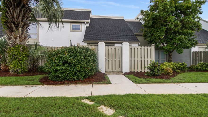 Welcome to Bay Point Golf Villas - Luxury Living in a Premier Gated Community. Nestled in the heart of the exclusive, gated Bay Point community in Panama City Beach, this beautifully updated 2-bedroom, 2.5-bath villa offers the perfect blend of comfort, style, and resort-style living. Bay Point is known for its world-class amenities, including a newly expanded marina, tennis courts, hotel, fine dining, and year-round community events. Golf enthusiasts will appreciate The Nicklaus Course at Bay Point--the first and only Nicklaus Design course in Northwest Florida. Formerly known as Lagoon Legends, this award-winning course has earned a reputation as one of the most challenging in the country. This two-story villa welcomes you with a private, fully fenced courtyardcomplete with pavers, seating space, a storage room, and room for your full-size garbage bin. Inside, the main level features stunning wood-look flooring, tile in the kitchen, and a bright, open layout. The kitchen is a cook's dream, featuring stainless steel appliances, new granite countertops, a stylish tile backsplash, deep double sink, and quality cabinetry. Adjacent to the kitchen is a spacious dining area with floor-to-ceiling impact windows that flood the space with natural light. The living room and Florida room also boast expansive windows and offer beautiful views of the golf course and serene pond. Step outside onto your covered back patioperfect for relaxing or watching golfers on the lush, green fairways. Upstairs, both bedrooms feature private, updated bathrooms and access to a covered balconyideal for enjoying your morning coffee with a view. The primary suite offers a luxurious walk-in shower with upgraded fixtures, including multiple spray settings and body jets. Additional features include impact sliding doors, added storage on the second floor, and fresh interior paint throughout. Whether you're seeking a full-time residence, vacation retreat, or investment property, this villa offers it all in one of Panama City Beach's most sought-after communities.