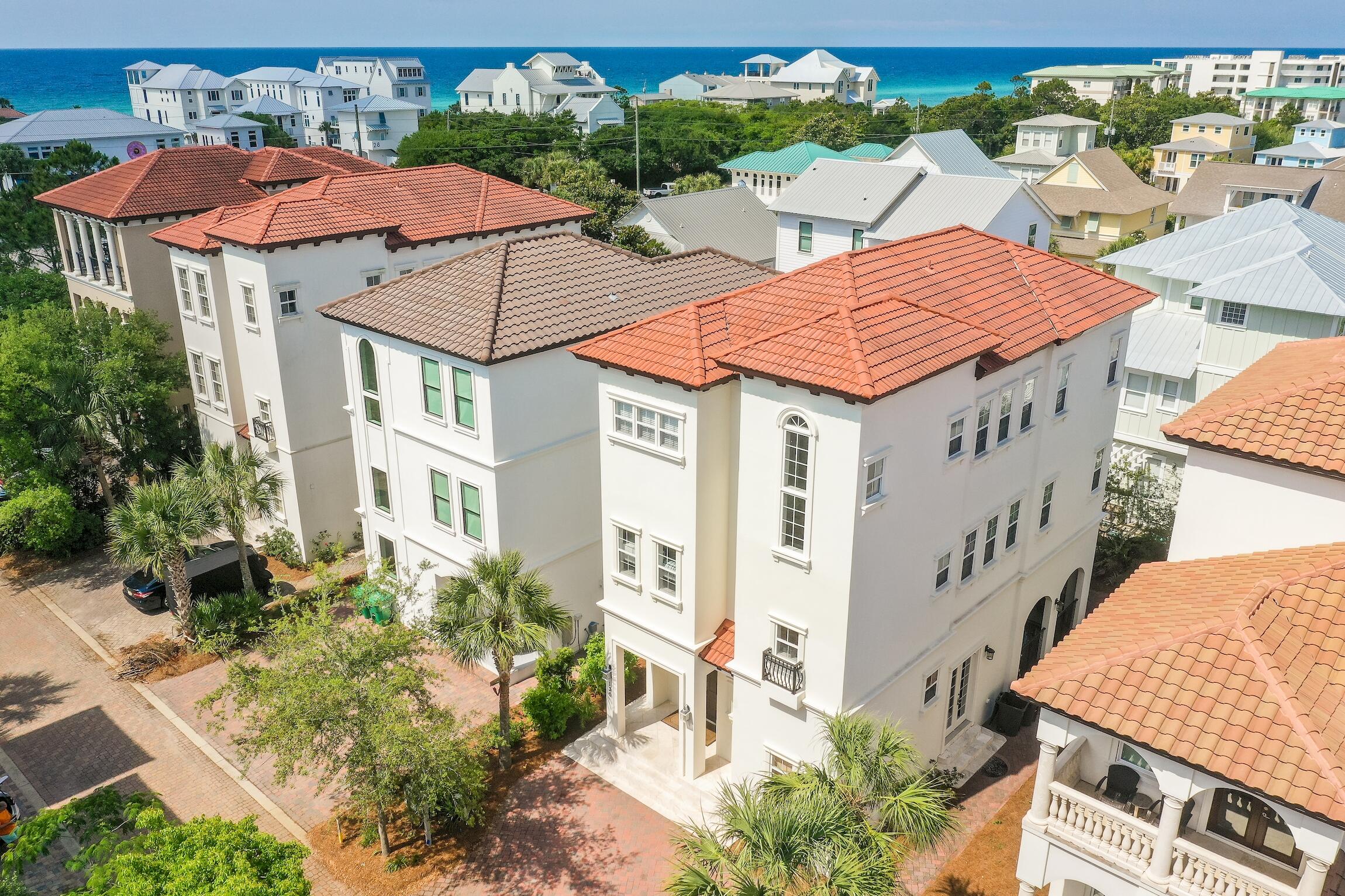 Motivated Seller! Incredibly priced Mediterranean-style beach house located in the heart of Seagrove Beach. Just a short walk from the Gulf's stunning white sands, this fully furnished home is ready for you to enjoy. Spend sunny days by the beach or relax by your private pool, set on a covered terrace with a convenient half bath. Situated in the exclusive, gated community of Palmeira Villas, offering easy access to Seaside, Seagrove Beach, and other popular attractions along 30A.The home boasts three generous master suites--one on the second floor and two on the third--each featuring an ensuite bathroom with dual-sink vanity, walk-in shower, and soaking tub. The second floor houses a large bunk room with two built-in bunks and an ensuite bath, along with a cozy sitting area and an additional full bath. Rental ready & booking up quickly. 6-seater golf cart is negotiable in the sale of this property!
