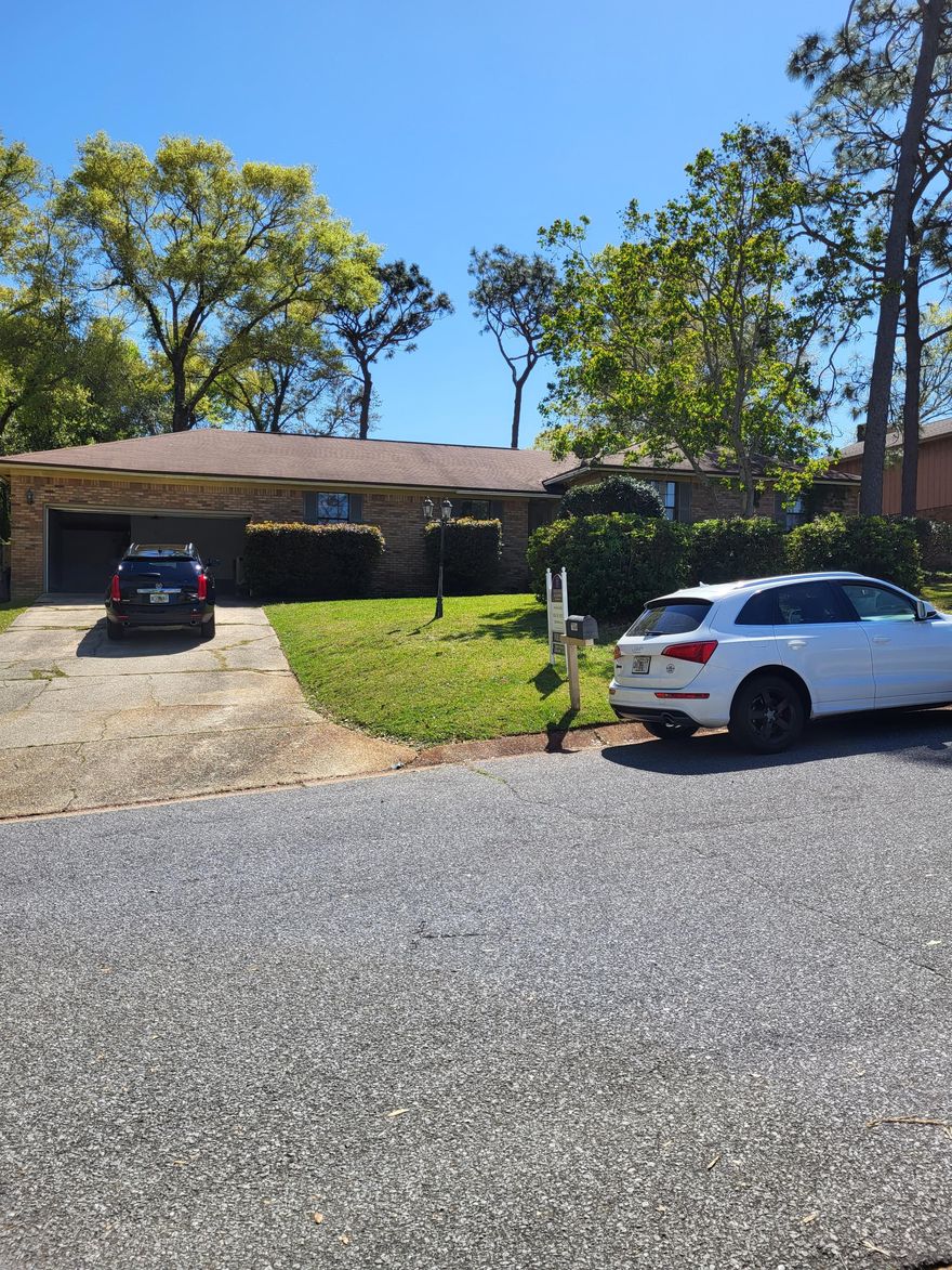 Baybrook homes rarely  come available. This 4/2 sits on 1/4 acre. Built in 1982, this home is split level with 2 steps up to the bedrooms on the west side of home. A very open floor plan with seemingly more room than the sq footage indicates. Skylight in the family room with a fireplace and a door leading to the fenced in back yard. A breakfast nook with a bay window is off the kitchen. There is also a large dining and living room combination. Separate utility room that leads out into the spacious garage. Ample storage throughout. Mature trees and vegetation. Near Scenic Highway and I-10. Incredibly convenient location and I-10 gives you quick access to everything.