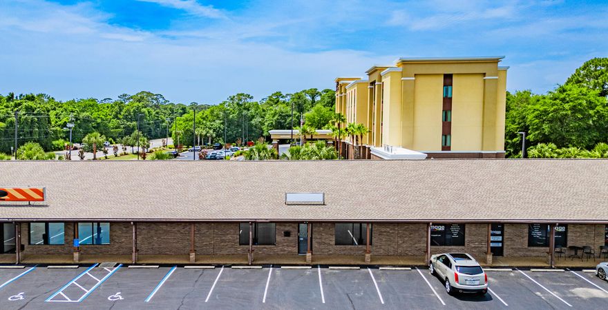 This a nicely appointed and conveniently located office unit in a professional office/retail plaza. The property is located on the highly-traveled Hollywood corridor and just off Mary Esther Cutoff in an outparcel of the Santa Rosa Mall and just a few minutes from the Fort Walton Beach Industrial Park and Hurlburt Air Force Base. The office features 4 offices, an area divided for 2 executive assistant desks, a large conference room, break room, mail room (could also be an additional office), storage area, reception and 2 bathrooms. In the complex is a CPA, an insurance agent, a print shop, and a barber shop. The complex has a relatively new roof and the parking lot has recently been resurfaced. The office can also be opened up into a store front retail space.