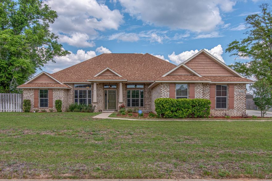 Stunning 4 bed/3 bath home situated on a half acre. It has been a second home and barely lived in since built in 2015. The owners did so many upgrades, over and above the standard. See a full list of those upgrades in the photos. Some features include gorgeous 1/2'' solid hardwood floors, 10' ceilings in the main living area w/11' trey & crown molding in the living & dining room. The kitchen is a chefs dream w/42'' upper cabinets, soft close drawers, top of the line appliances & gorgeous granite, overlooking the living room with stack stone fireplace. The master suite offers trey ceiling & crown molding, 2 walk in closets and luxury bath w/soaking tub and oversized tile shower w/rain shower head, double vanities and shiplap wall accent. Please click ''more'' for additional information...
